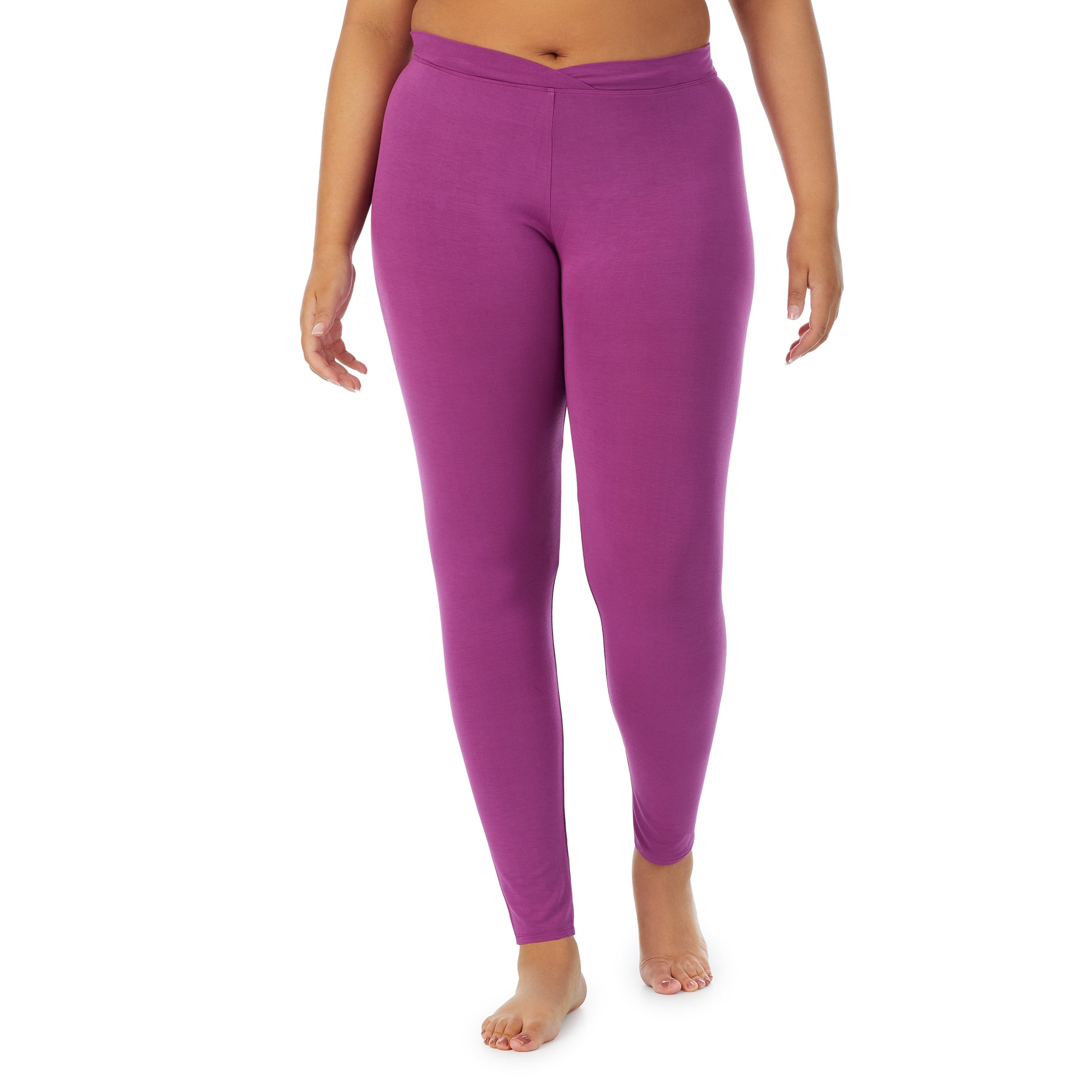 A lady wearing a Purple Radiance stretch legging plus.