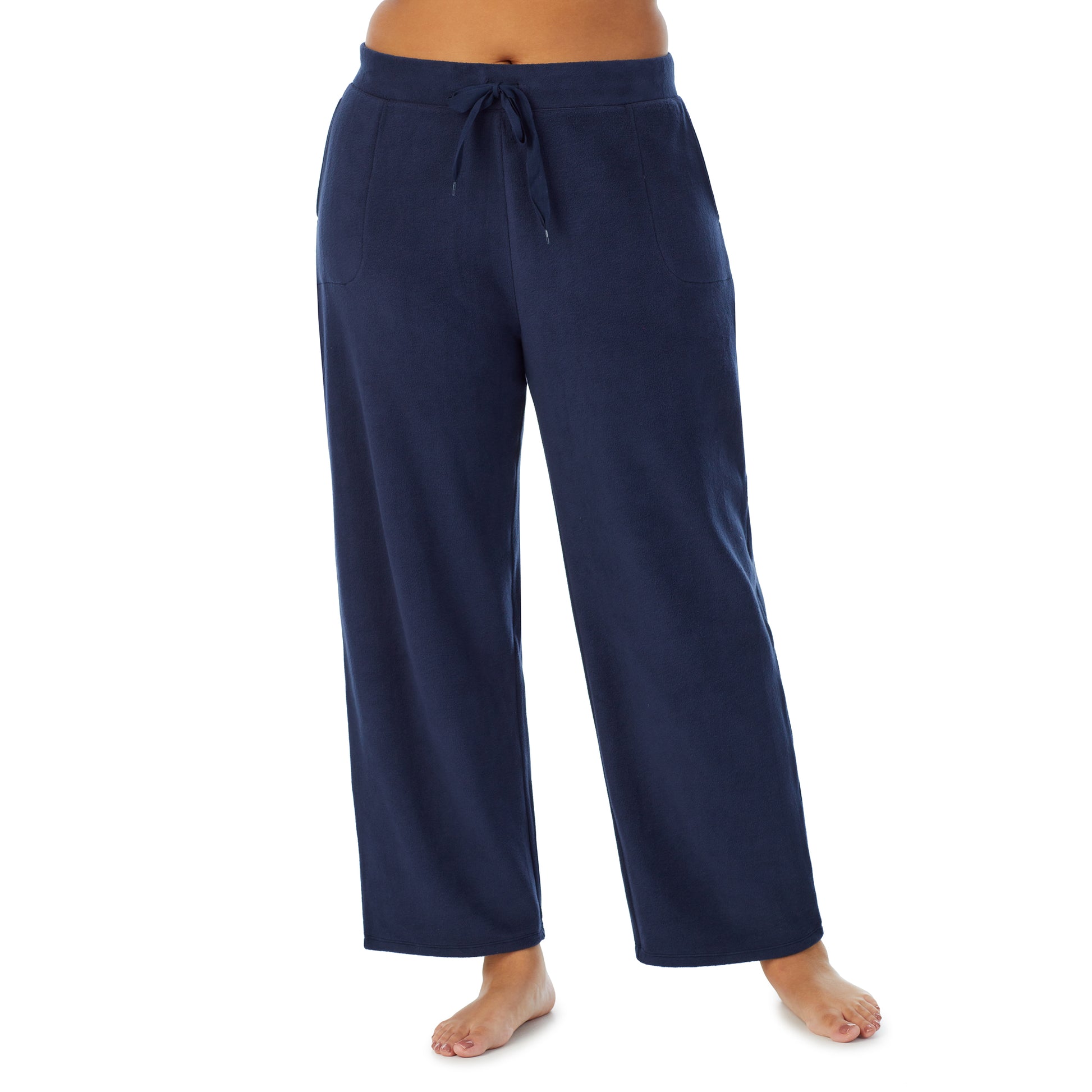 A lady wearing navy blazer fleecewear with stretch lounge pant plus.