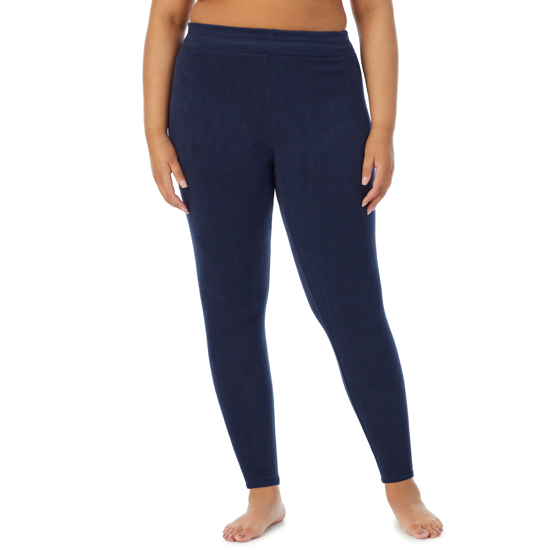 A lady wearing navy blazer fleecewear with stretch legging plus.