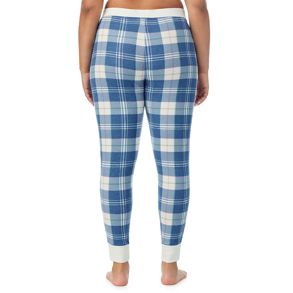 Blue Plaid; Model is wearing size 1X. She is 5'11", Bust 36", Waist 36.5", Hips 47.5"@ A Lady is wearing a Blue Plaid Cozy Stretch Thermal Legging PLUS