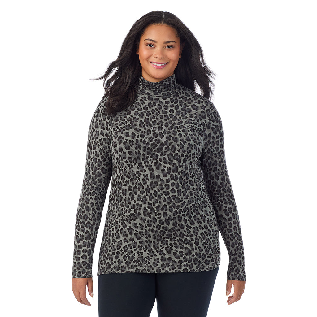 Charcoal Leopard; Model is wearing size 1X. She is 5'11", Bust 36", Waist 36.5", Hips 47.5". @A lady wearing charcoal leopard long sleeve turtleneck plus softwear with stretch top.