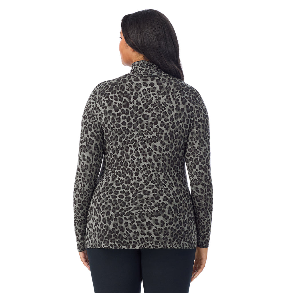 Charcoal Leopard; Model is wearing size 1X. She is 5'11", Bust 36", Waist 36.5", Hips 47.5". @A lady wearing charcoal leopard long sleeve turtleneck plus softwear with stretch top.