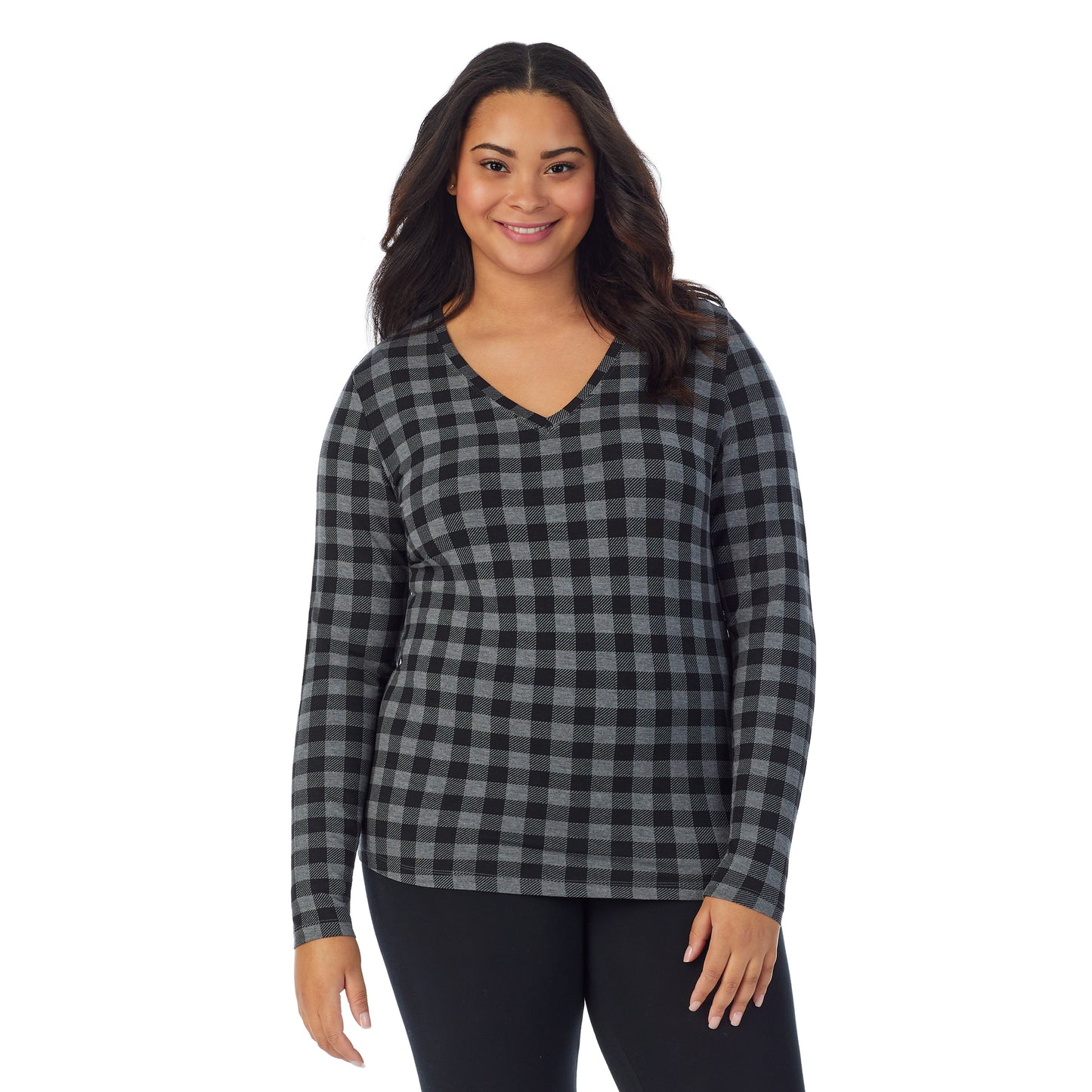 Tonal Buffalo; Model is wearing size 1X. She is 5'11", Bust 36", Waist 36.5", Hips 47.5". @A lady wearing tonal buffalo long sleeve v-neck plus softwer with stretch top.