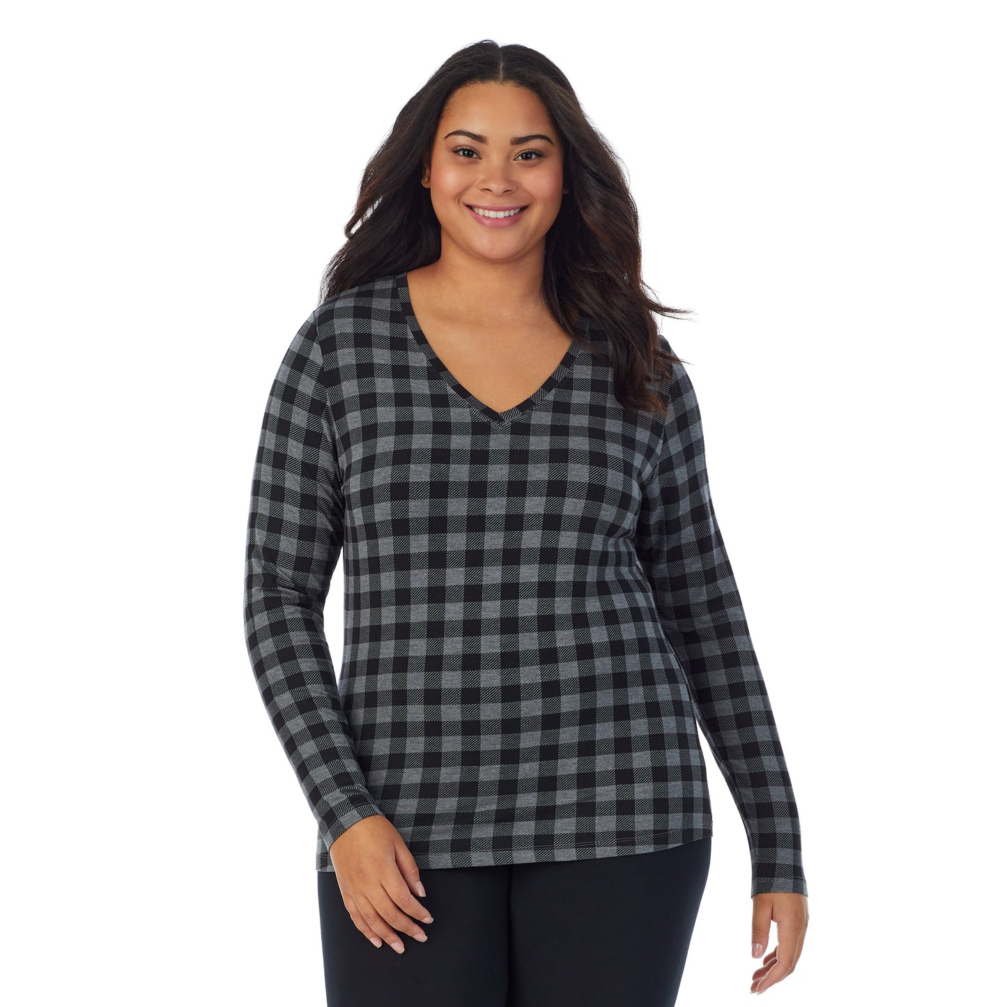 Tonal Buffalo; Model is wearing size 1X. She is 5'11", Bust 36", Waist 36.5", Hips 47.5". @A lady wearing tonal buffalo long sleeve v-neck plus softwer with stretch top.