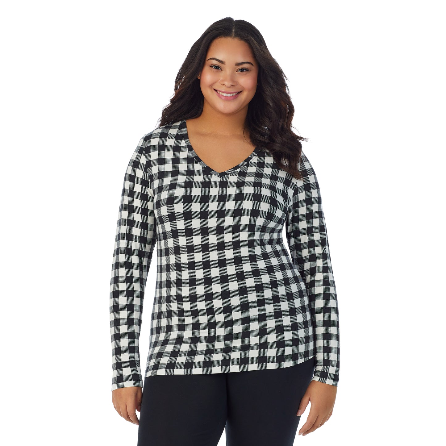Ivory Buffalo; Model is wearing size 1X. She is 5'11", Bust 36", Waist 36.5", Hips 47.5". @A lady wearing ivory buffalo long sleeve v-neck plus softwer with stretch top.