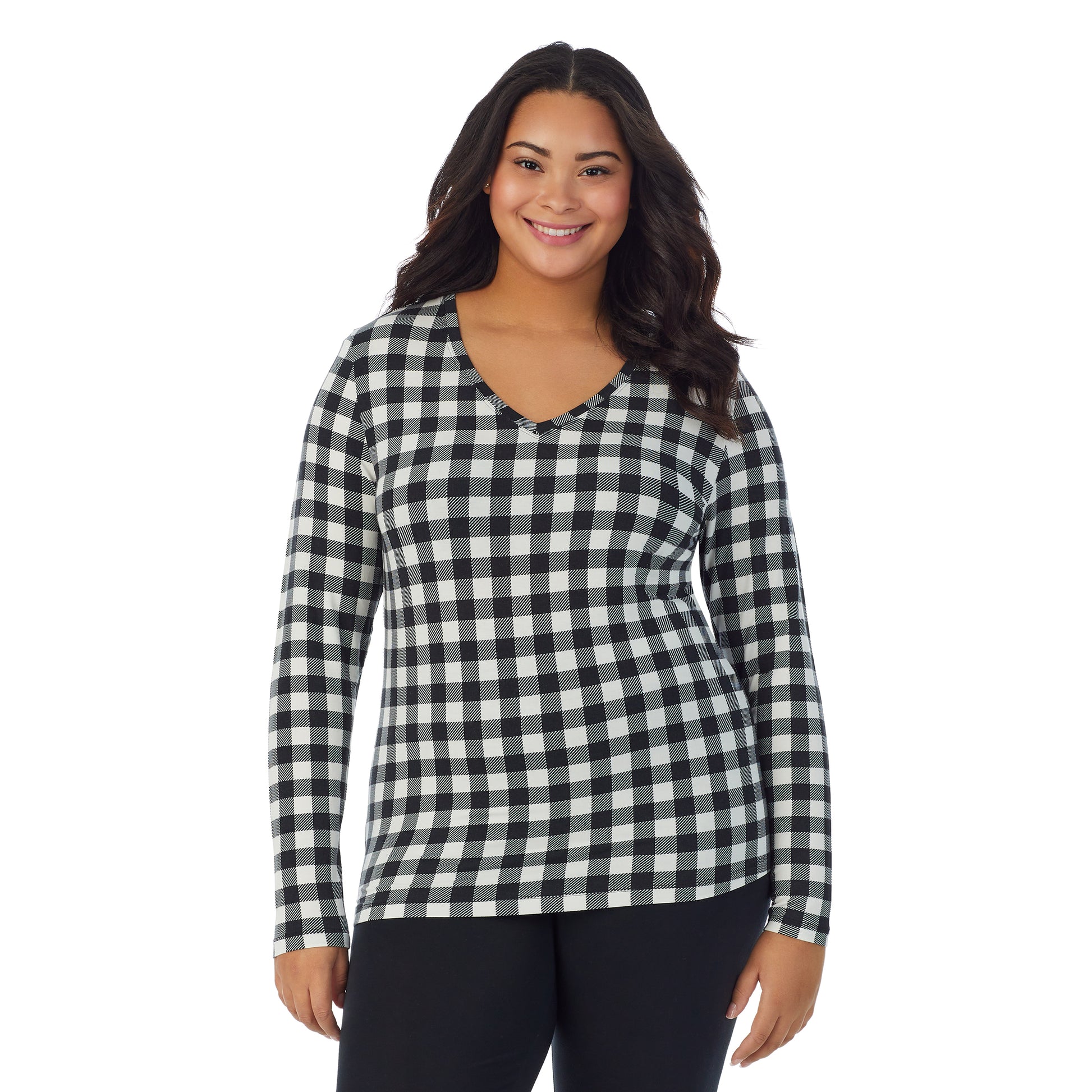 A lady wearing ivory buffalo long sleeve v-neck plus softwer with stretch top.