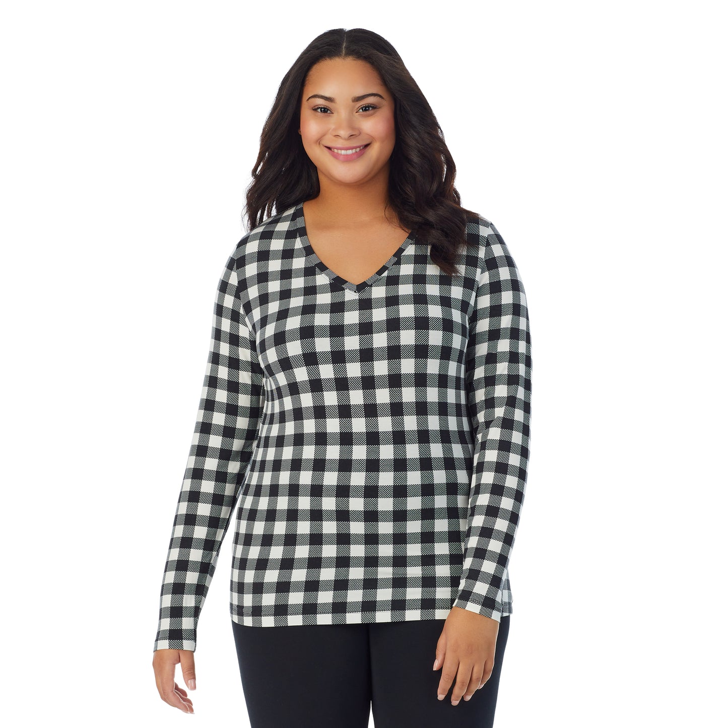 Ivory Buffalo; Model is wearing size 1X. She is 5'11", Bust 36", Waist 36.5", Hips 47.5". @A lady wearing ivory buffalo long sleeve v-neck plus softwer with stretch top.