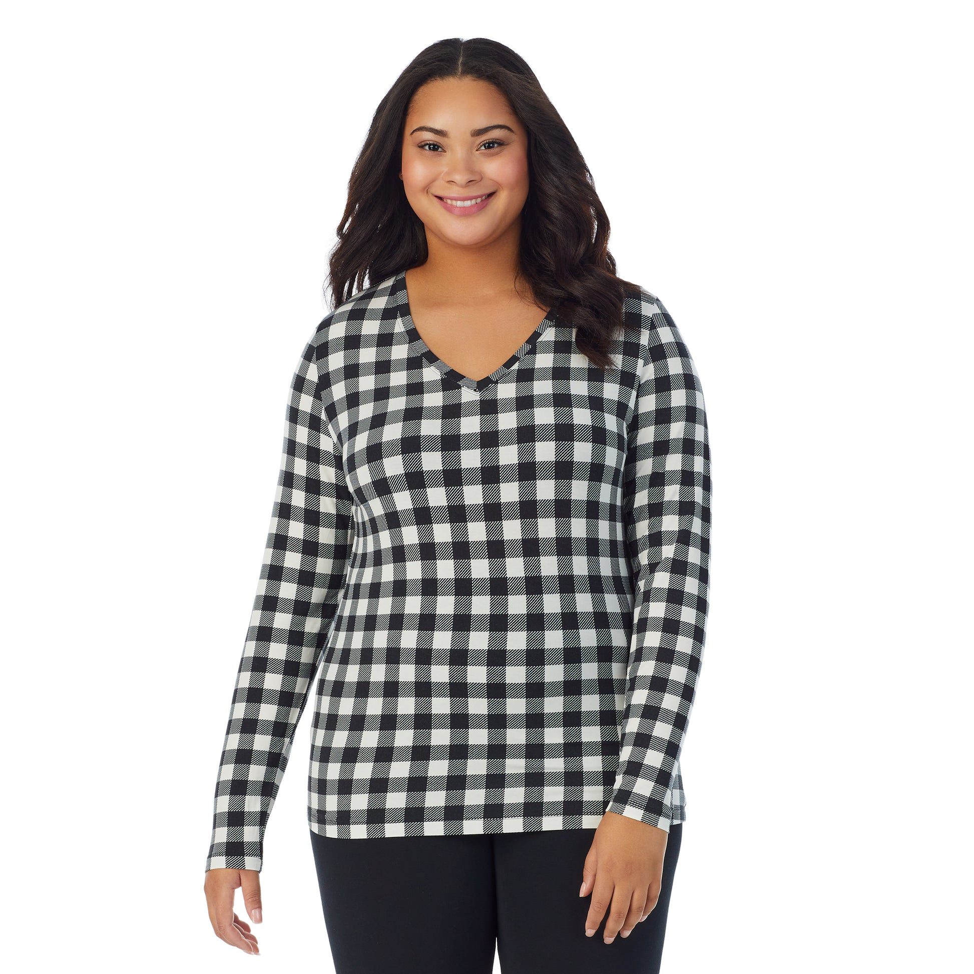 A lady wearing ivory buffalo long sleeve v-neck plus softwer with stretch top.