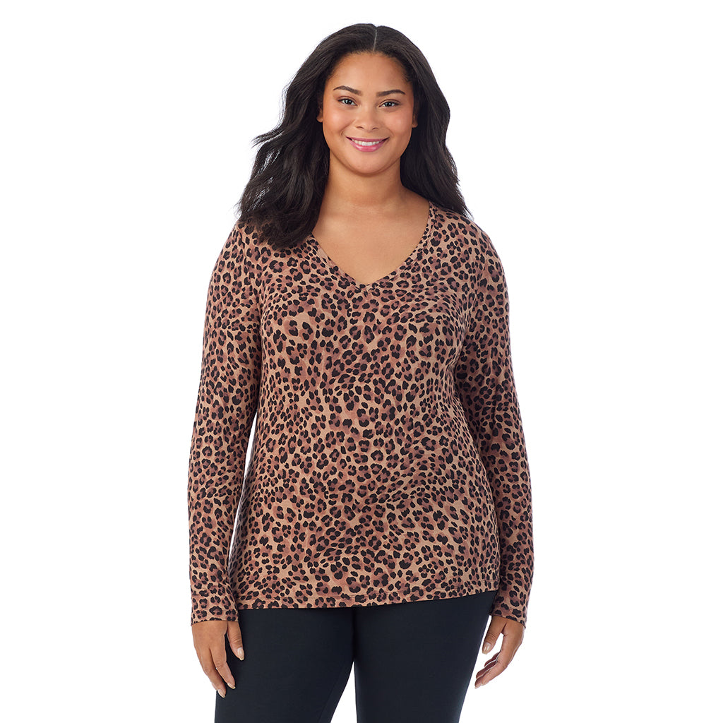 Taupe Leopard; Model is wearing size 1X. She is 5'11", Bust 36", Waist 36.5", Hips 47.5". @A lady wearing taupe leopard long sleeve v-neck plus softwer with stretch top.