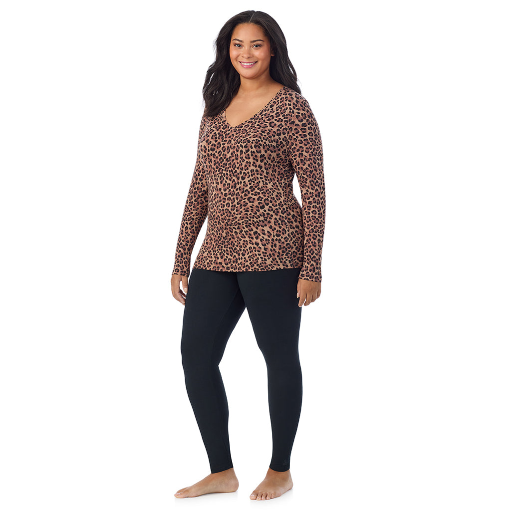 Taupe Leopard; Model is wearing size 1X. She is 5'11", Bust 36", Waist 36.5", Hips 47.5". @A lady wearing taupe leopard long sleeve v-neck plus softwer with stretch top.
