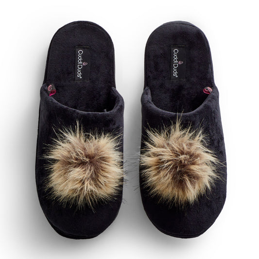 A black velour scuff slipper with velour lining & faux fur pom.