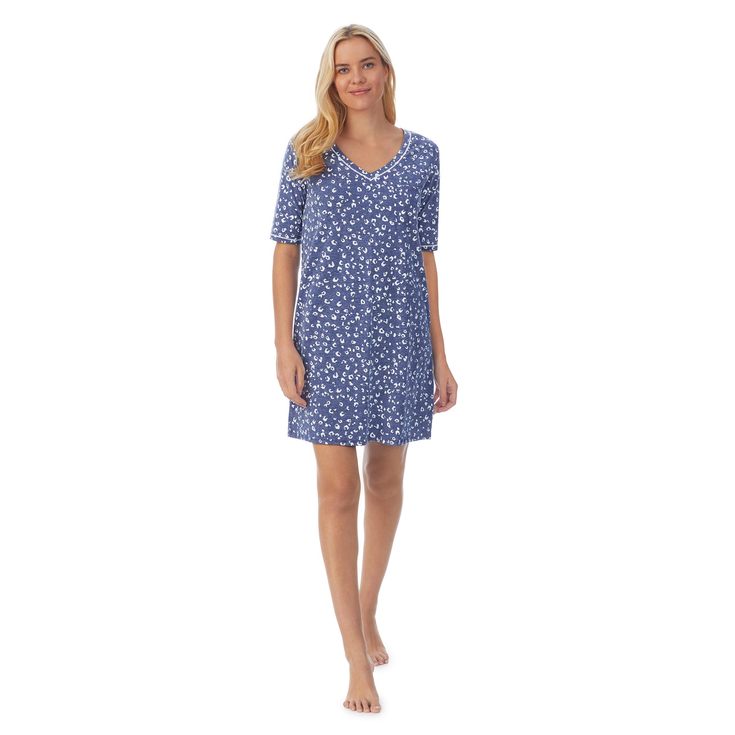 Navy Animal; Model is wearing size S. She is 5'9", Bust 34", Waist 26", Hips 36".@ A lady wearingCuddl Smart Elbow Sleeve Sleep Tee with Navy Animal print
