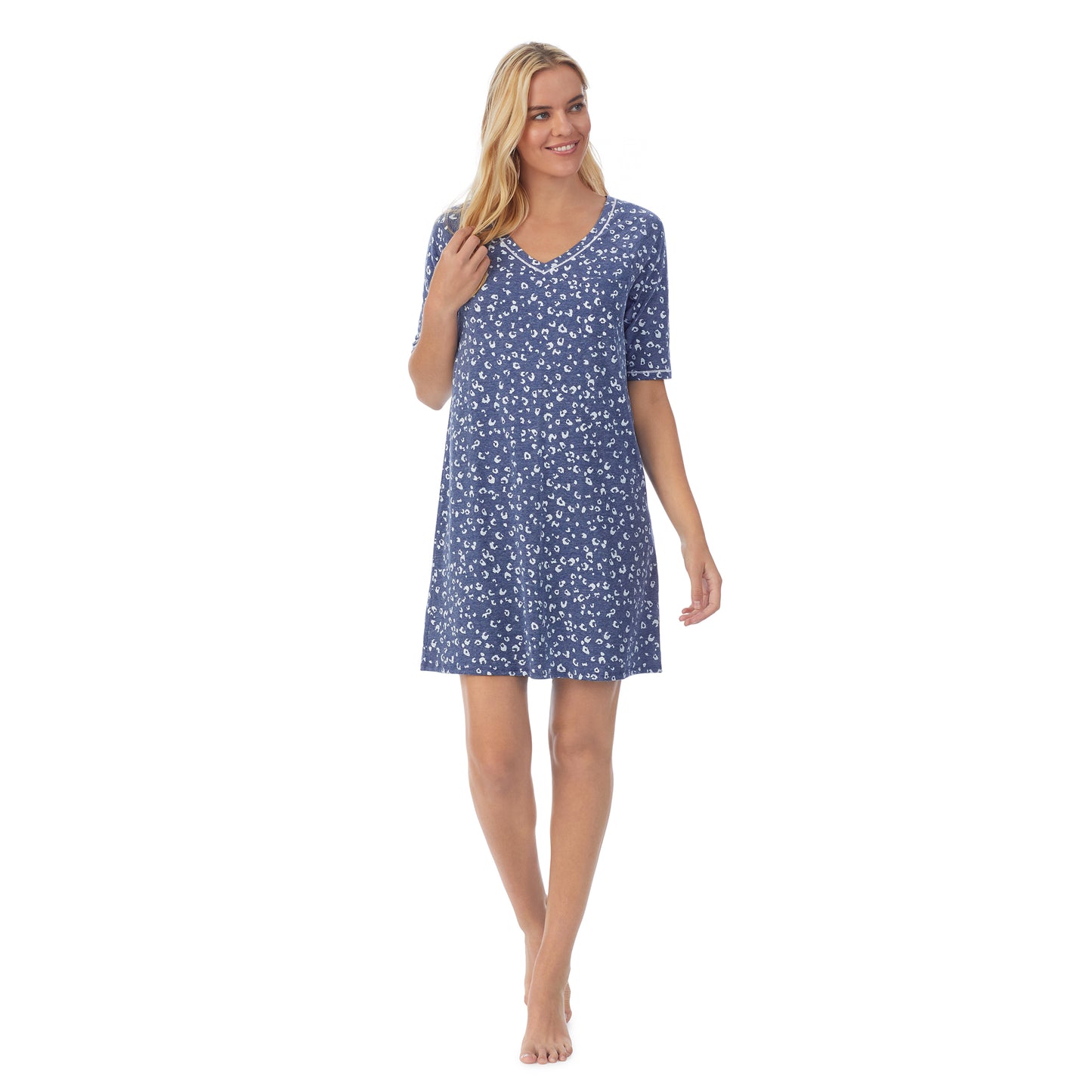 Navy Animal; Model is wearing size S. She is 5'9", Bust 34", Waist 26", Hips 36".@ A lady wearingCuddl Smart Elbow Sleeve Sleep Tee with Navy Animal print