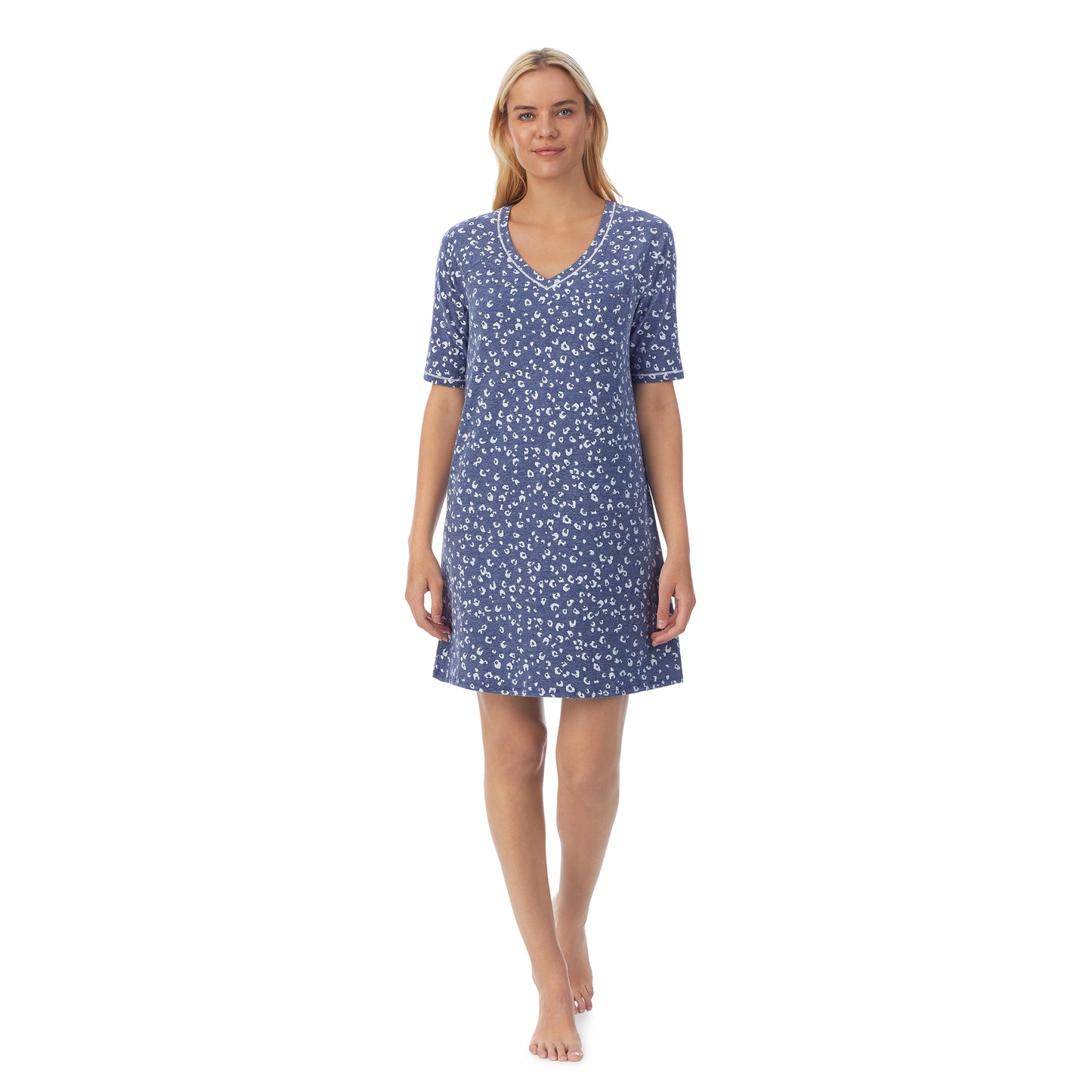 Navy Animal; Model is wearing size S. She is 5'9", Bust 34", Waist 26", Hips 36".@ A lady wearingCuddl Smart Elbow Sleeve Sleep Tee with Navy Animal print