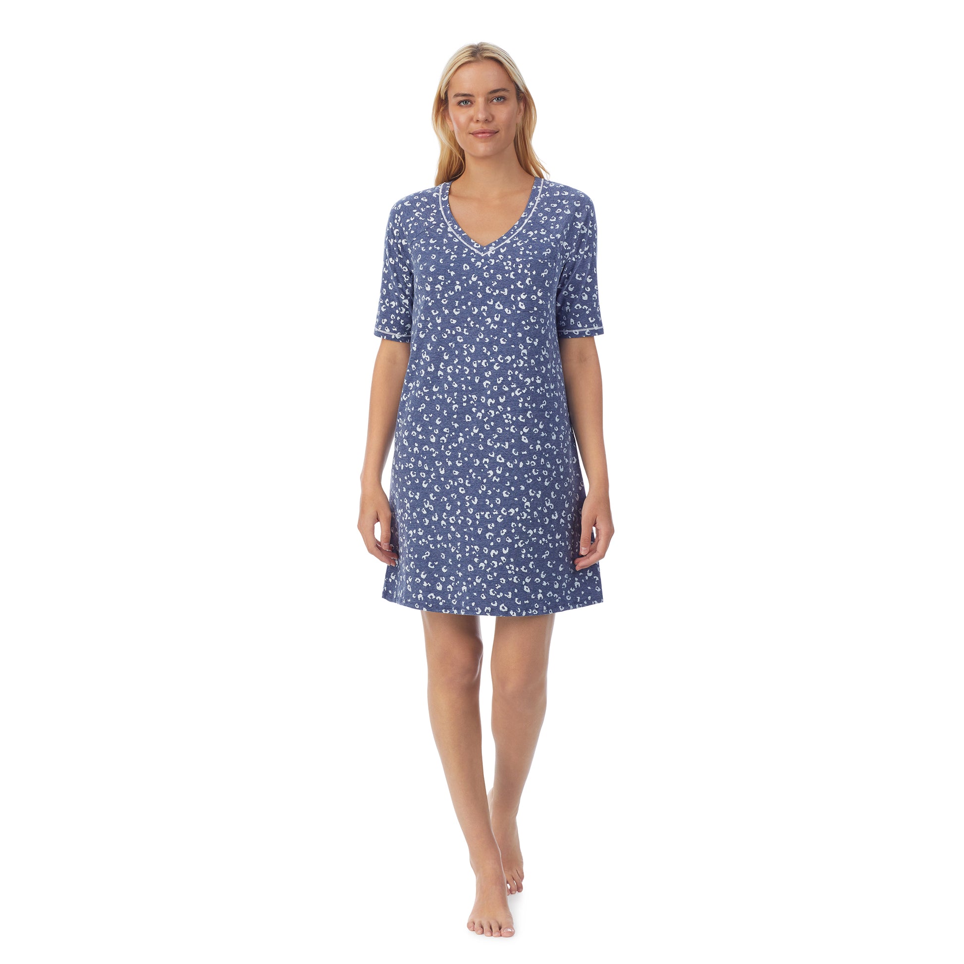 A lady wearingCuddl Smart Elbow Sleeve Sleep Tee with Navy Animal print