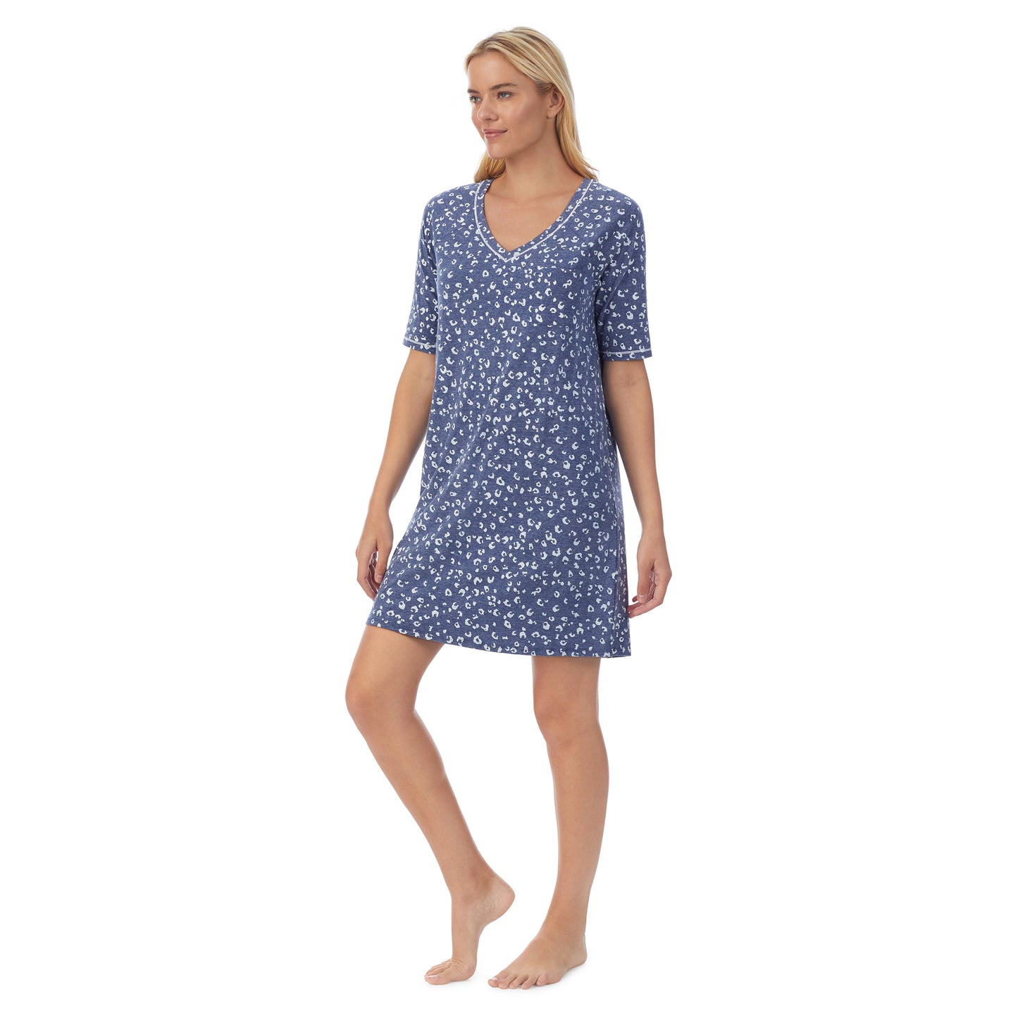 Navy Animal; Model is wearing size S. She is 5'9", Bust 34", Waist 26", Hips 36".@ A lady wearingCuddl Smart Elbow Sleeve Sleep Tee with Navy Animal print