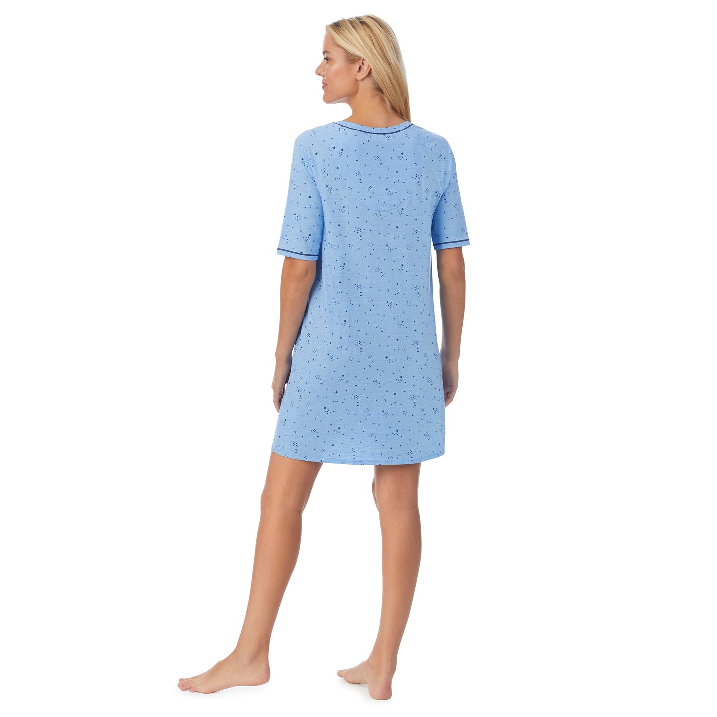 Navy Celestial; Model is wearing size S. She is 5'9", Bust 34", Waist 26", Hips 36".@ A lady wearingCuddl Smart Elbow Sleeve Sleep Tee with Navy Celestial print
