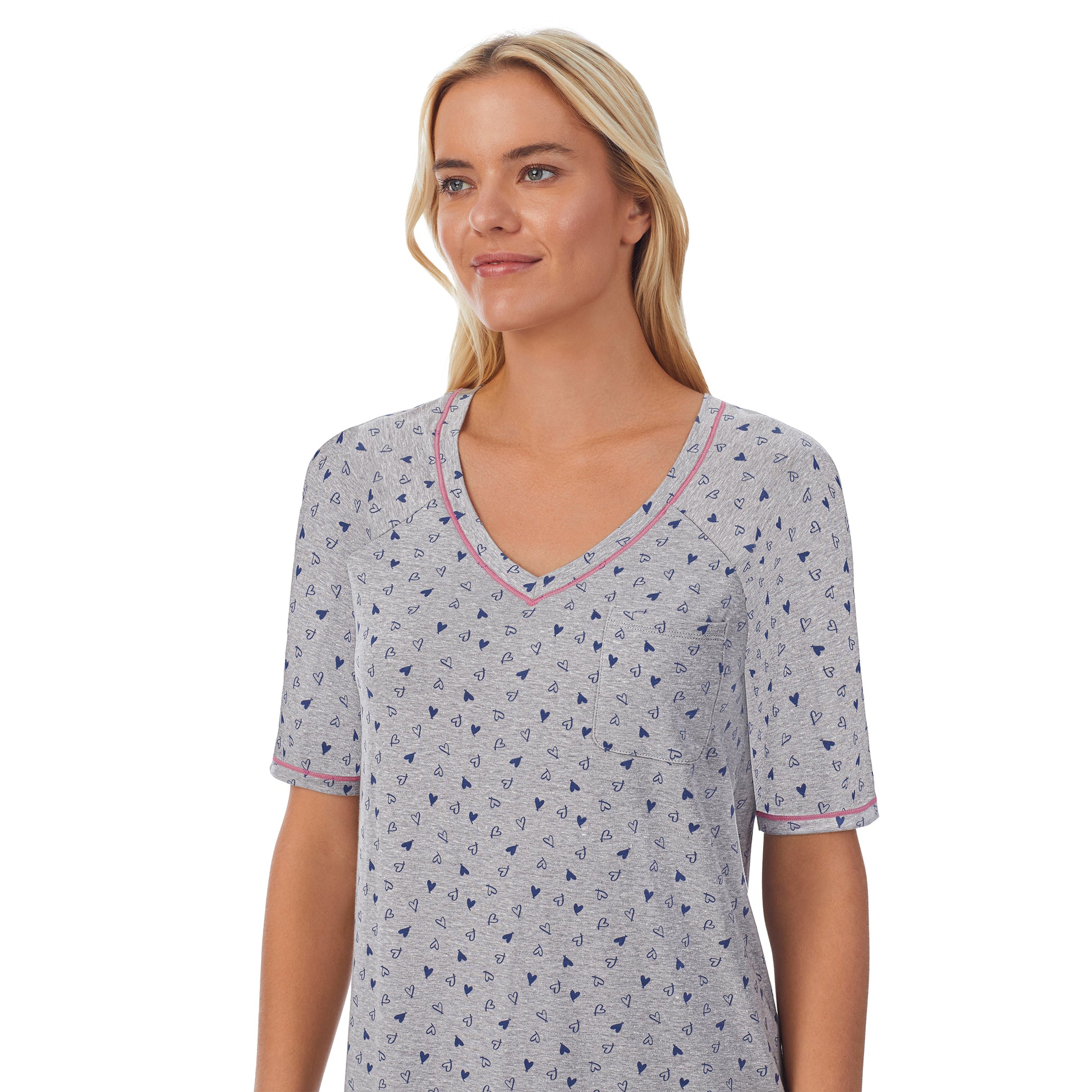 A lady wearingCuddl Smart Elbow Sleeve Sleep Tee with Heather Hearts print