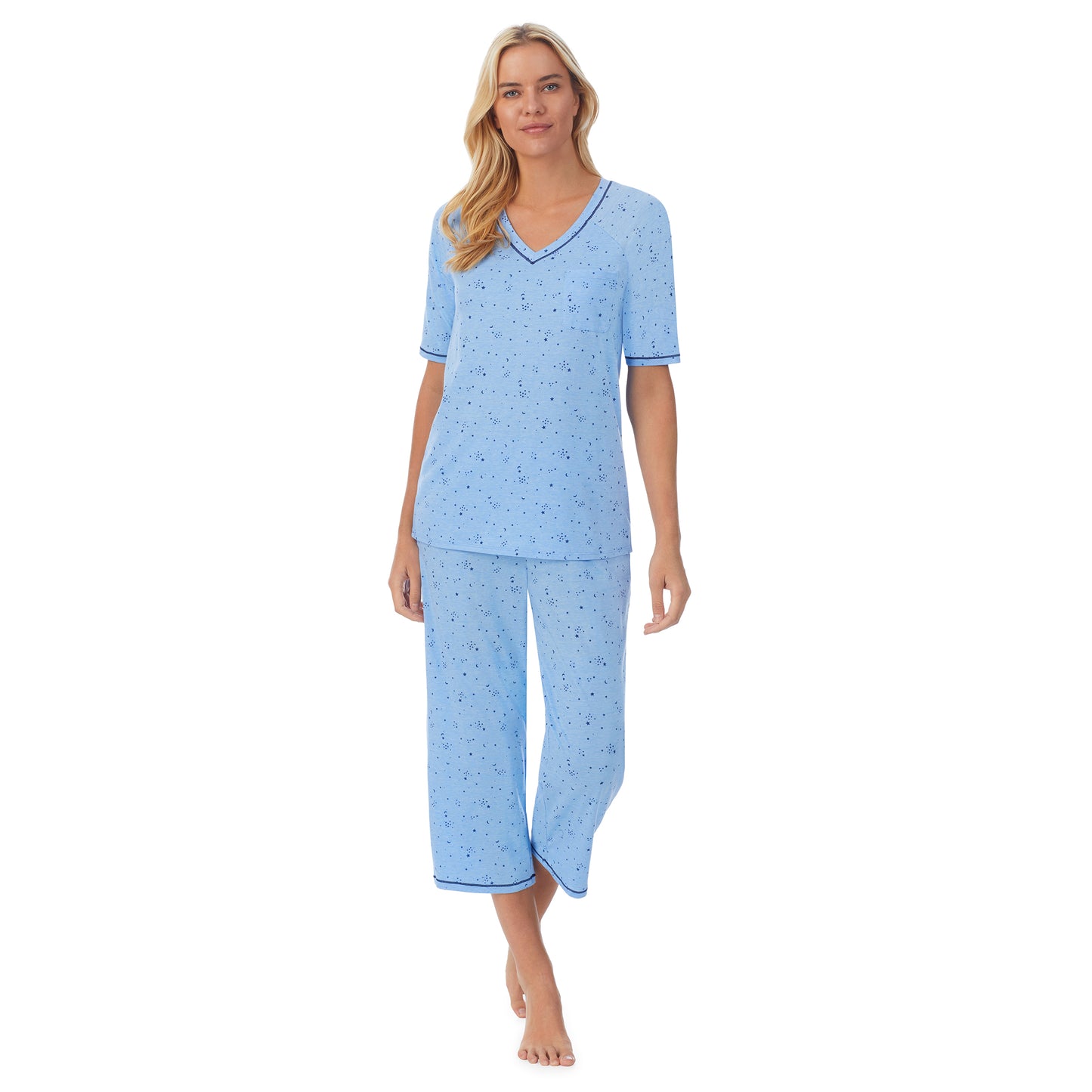 Navy Celestial;Model is wearing size S. She is 5'9", Bust 34", Waist 26", Hips 36".@ A lady wearingCuddl Smart Elbow Sleeve Top with Cropped Pant Pajama Set with Navy Celestial print