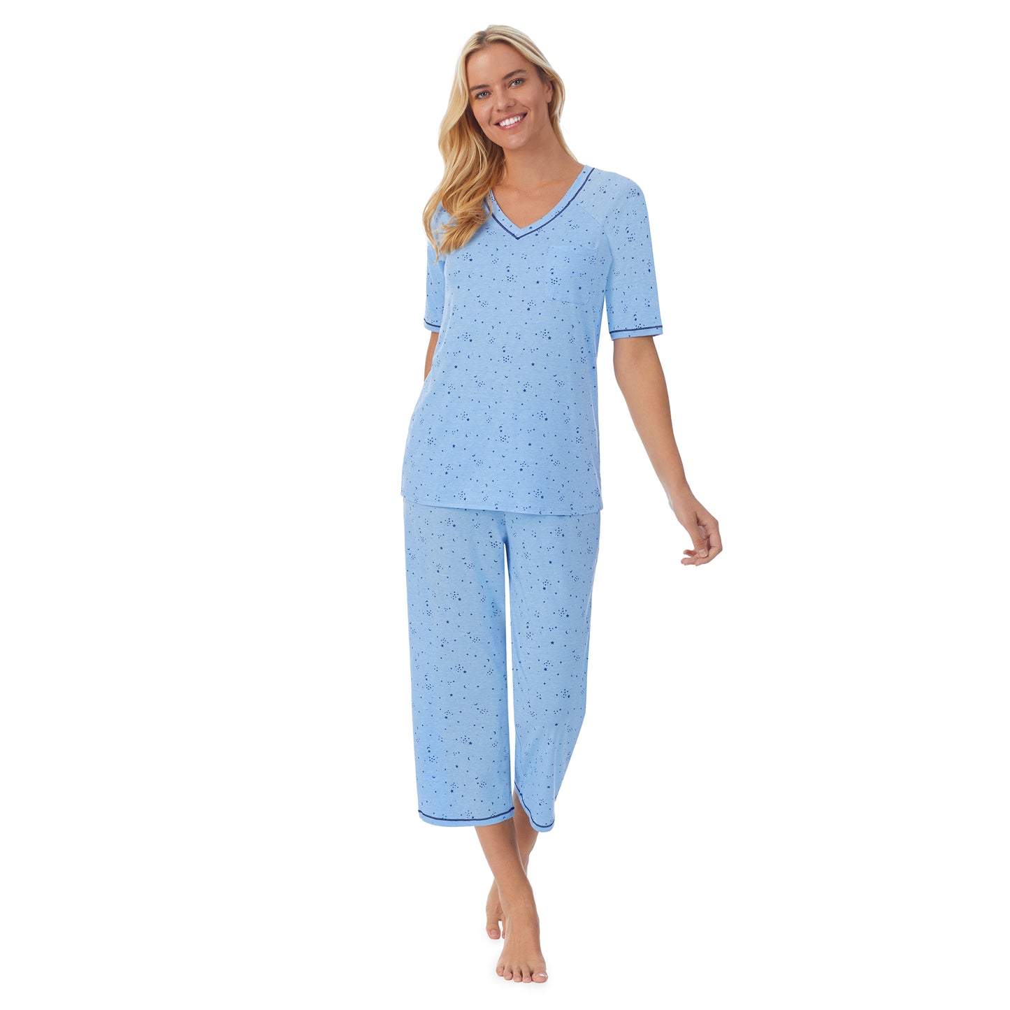 Navy Celestial;Model is wearing size S. She is 5'9", Bust 34", Waist 26", Hips 36".@ A lady wearingCuddl Smart Elbow Sleeve Top with Cropped Pant Pajama Set with Navy Celestial print