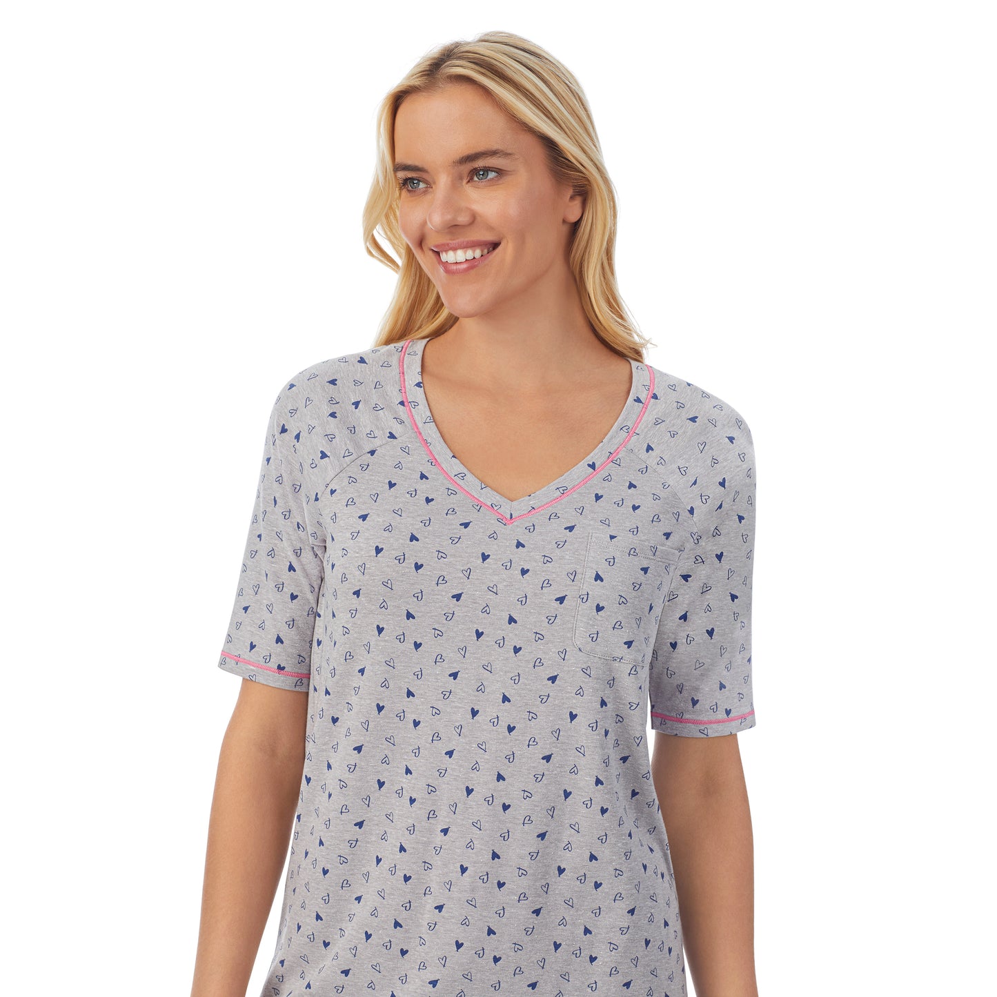 Heather Hearts;Model is wearing size S. She is 5'9", Bust 34", Waist 26", Hips 36".@ A lady wearingCuddl Smart Elbow Sleeve Top with Cropped Pant Pajama Set with Heather Hearts print