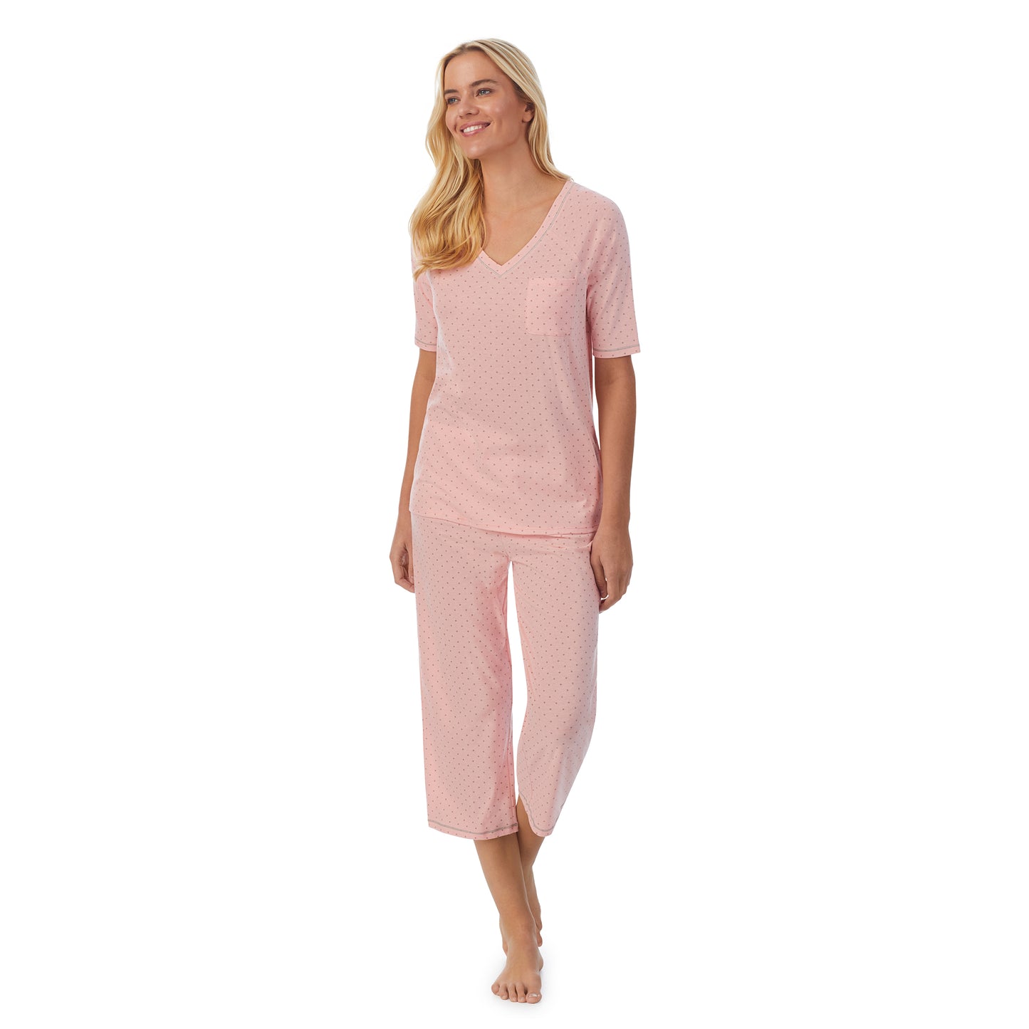 Dot;Model is wearing size S. She is 5'9", Bust 34", Waist 26", Hips 36".@ A lady wearingCuddl Smart Elbow Sleeve Top with Cropped Pant Pajama Set with Dot print