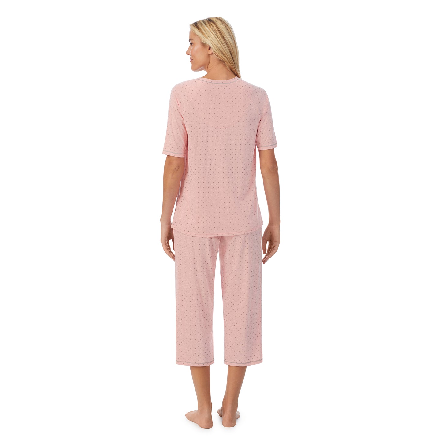 Dot;Model is wearing size S. She is 5'9", Bust 34", Waist 26", Hips 36".@ A lady wearingCuddl Smart Elbow Sleeve Top with Cropped Pant Pajama Set with Dot print