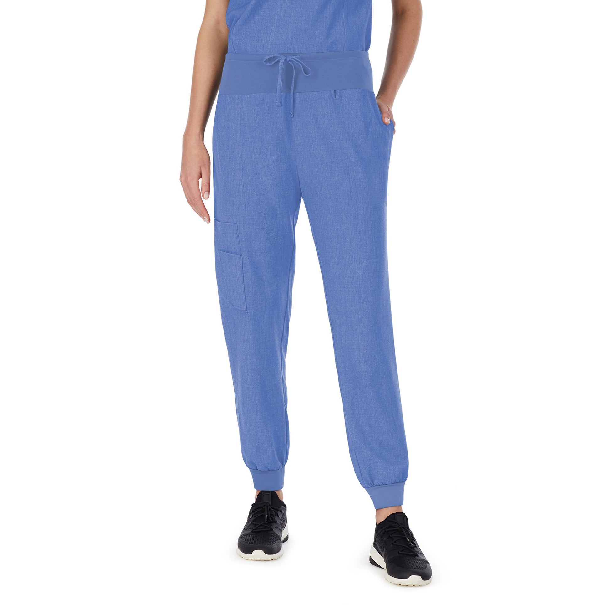 A lady wearing ceil heather scrub jogger pant petite.