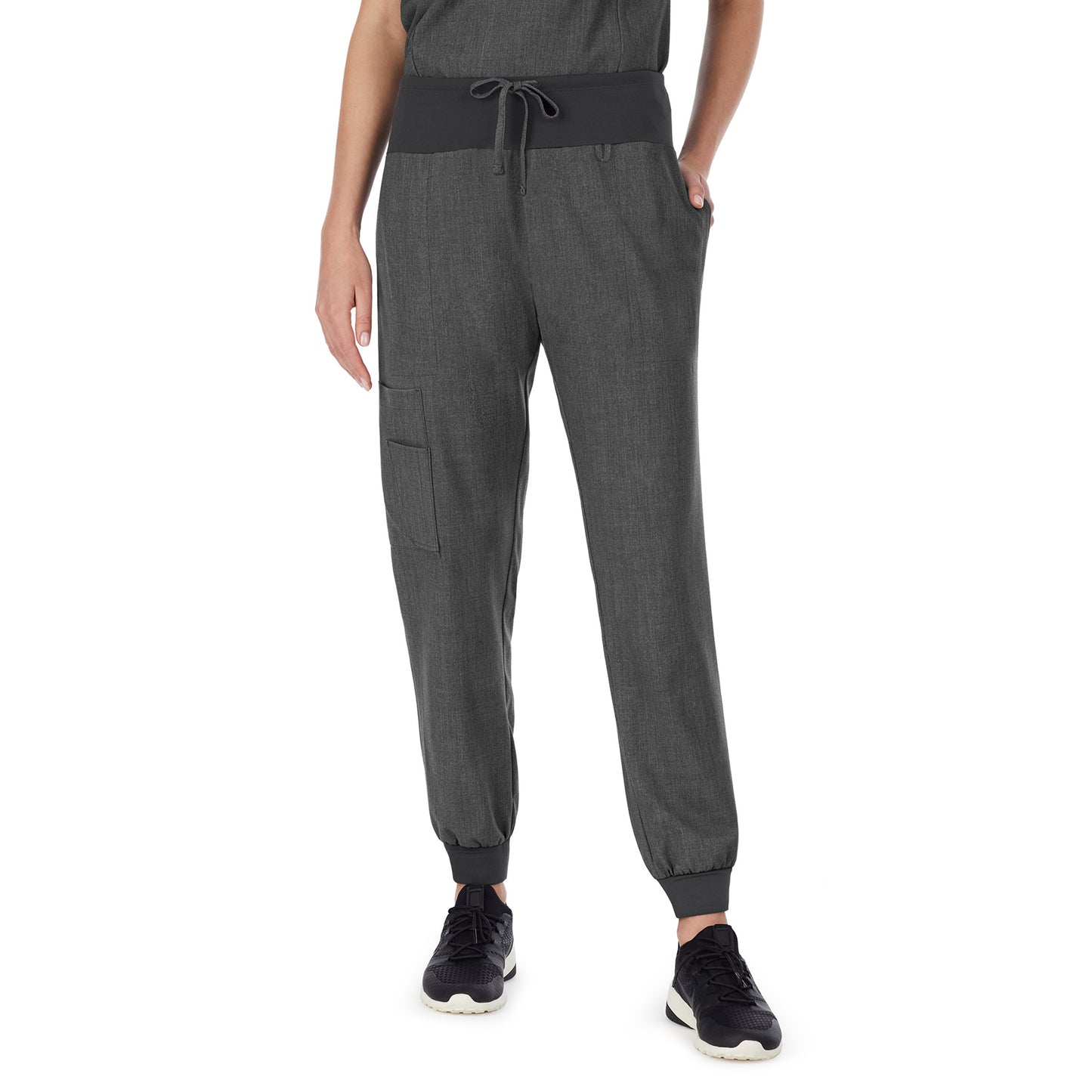 Charcoal Heather;Model is wearing size S. She is 5’9”, Bust 32”, Waist 23", Hips 34.5”.@A lady wearing Charcoal Heather scrub jogger pant.
