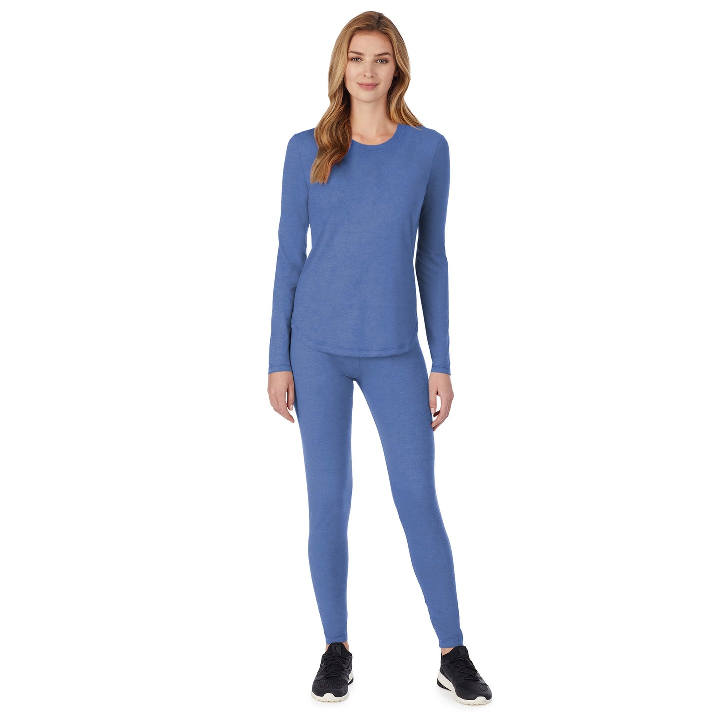 Ceil;Model is wearing size S. She is 5’9”, Bust 32”, Waist 23", Hips 34.5”.@A lady wearing a ceil long sleeve underscrub crew neck top.