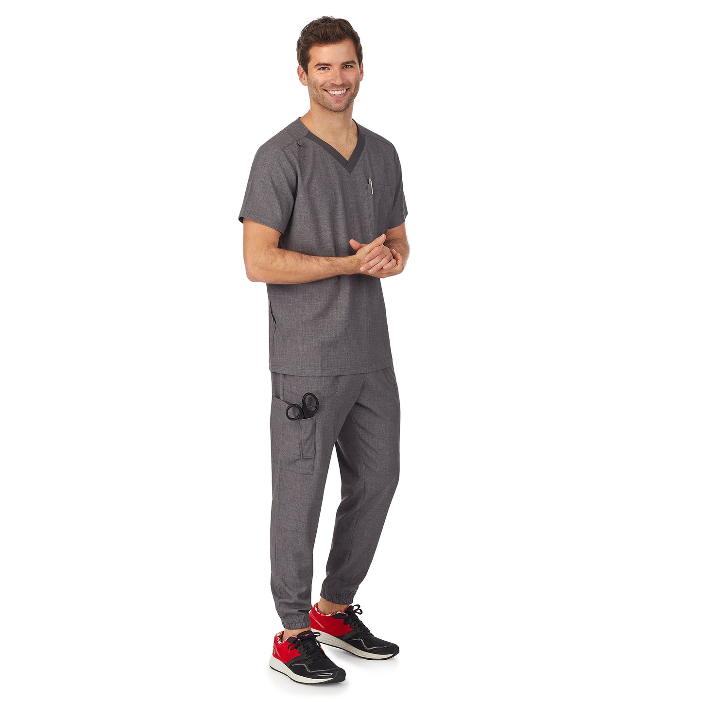 Charcoal Heather;Model is wearing size M. He is 6'2", Waist 32", Inseam 32".@A man wearing charcoal heather scrub v-neck top with pockets.