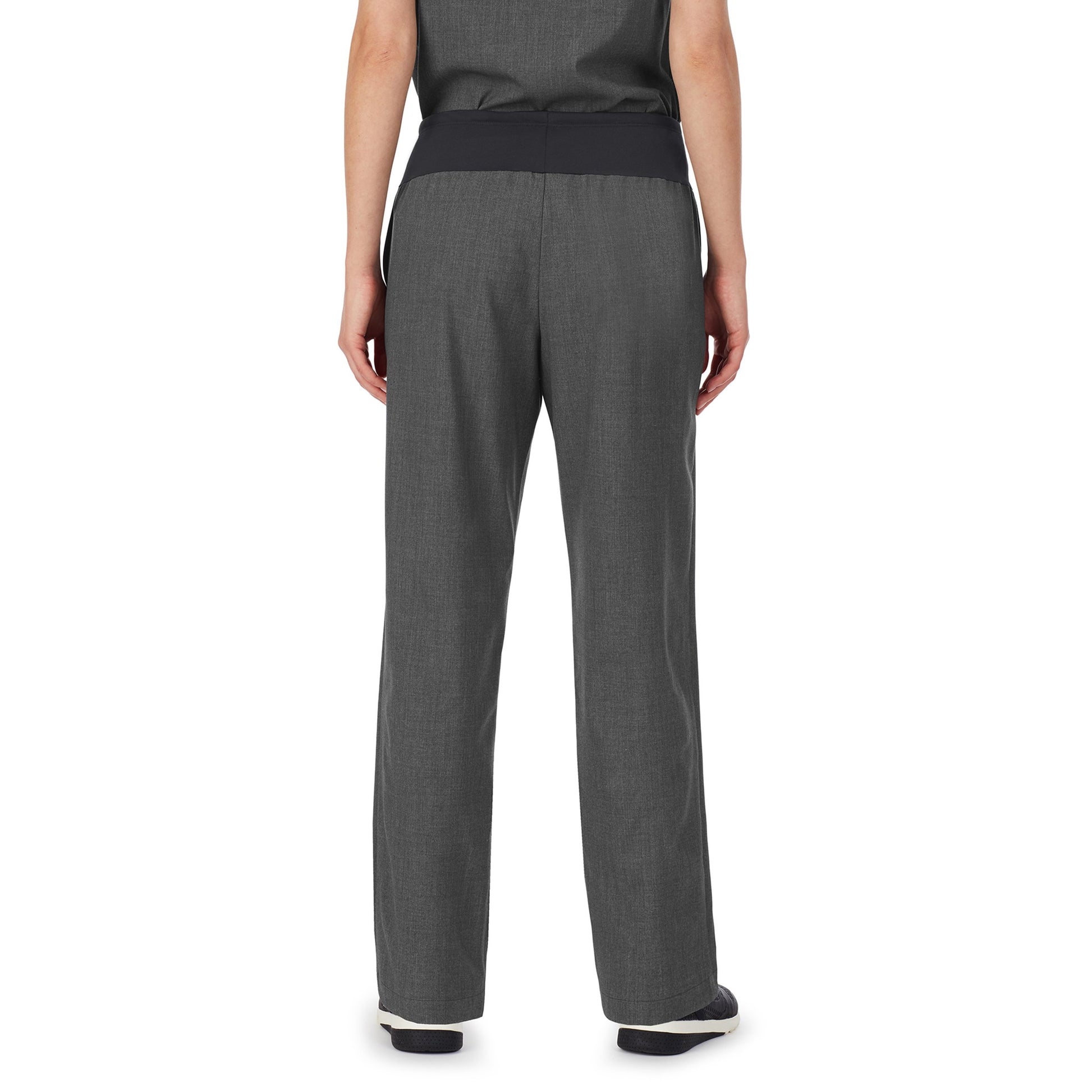 A lady wearing charcoal heather scrub classic pant.