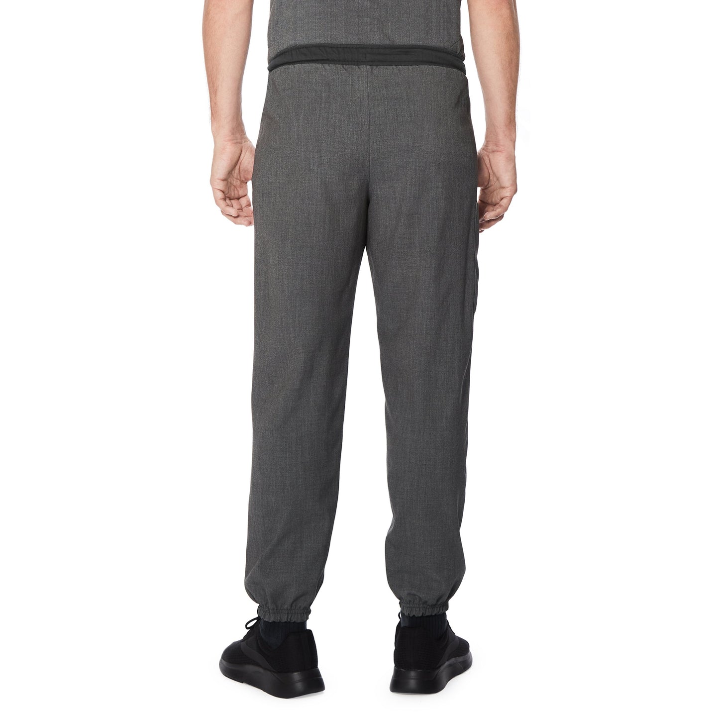 Charcoal Heather;Model is wearing size M. He is 6'2", Waist 32", Inseam 32".@A man wearing a charcoal heather scrub jogger pant.