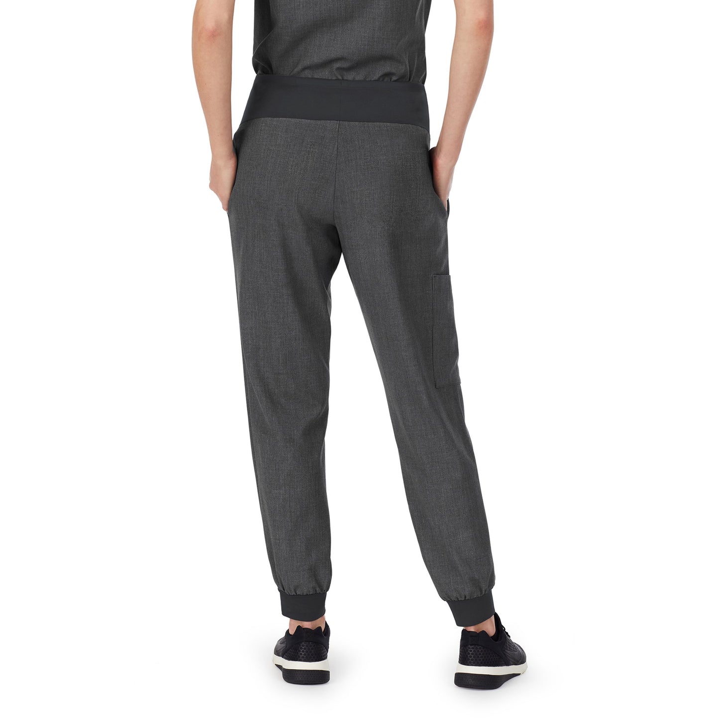 Charcoal Heather;Model is wearing size S. She is 5’9”, Bust 32”, Waist 23", Hips 34.5”.@A lady wearing Charcoal Heather scrub jogger pant.