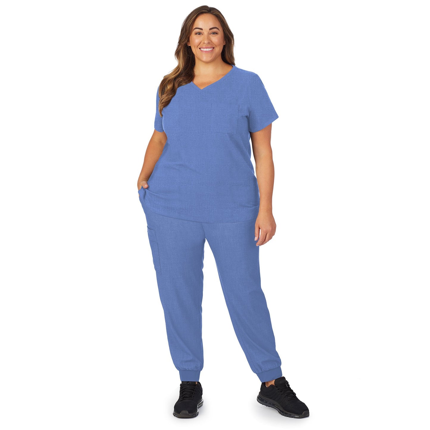 Ceil Heather;Model is wearing size 1X. She is 5’9.5”, Bust 43”, Waist 37”, Hips 49.5”.@A lady wearing ceil heather scrub v-neck top with chest pocket plus.
