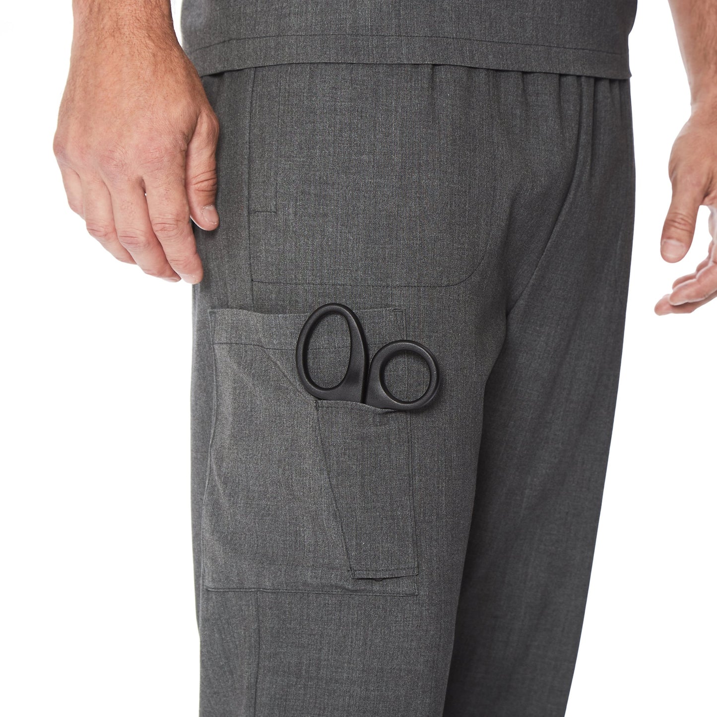 Charcoal Heather;Model is wearing size M. He is 6'2", Waist 32", Inseam 32".@A man wearing a charcoal heather scrub jogger pant.