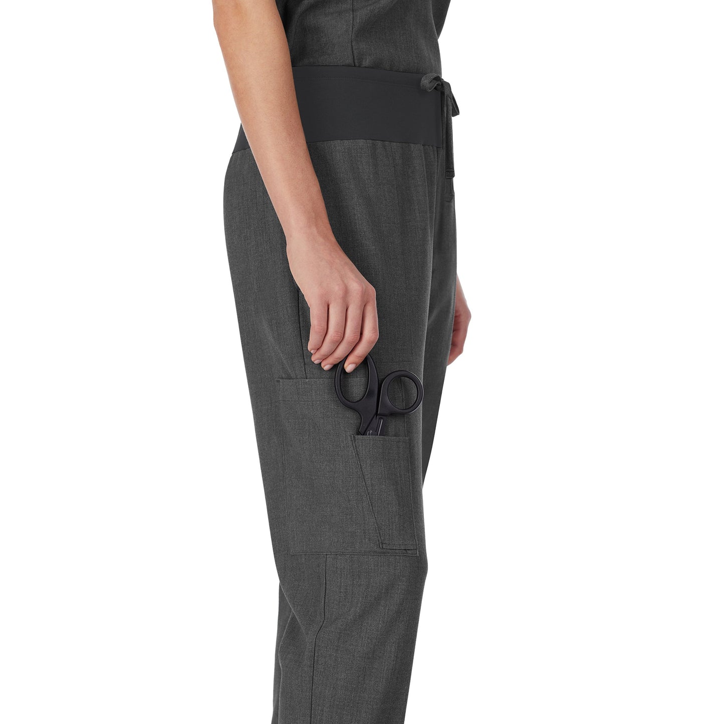 Charcoal Heather;Model is wearing size S. She is 5’9”, Bust 32”, Waist 23", Hips 34.5”.@A lady wearing Charcoal Heather scrub jogger pant.