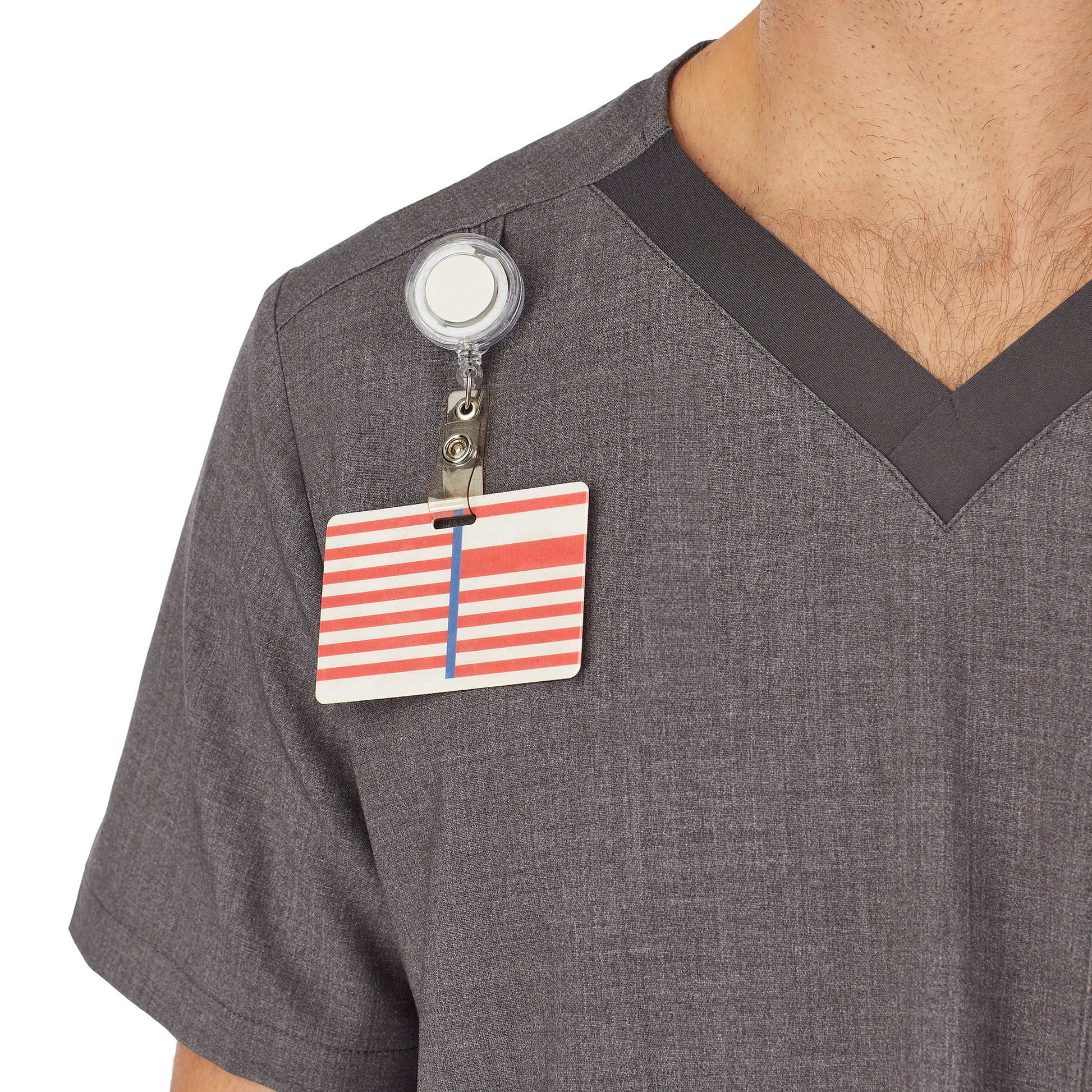 A man wearing charcoal heather scrub v-neck top with pockets.