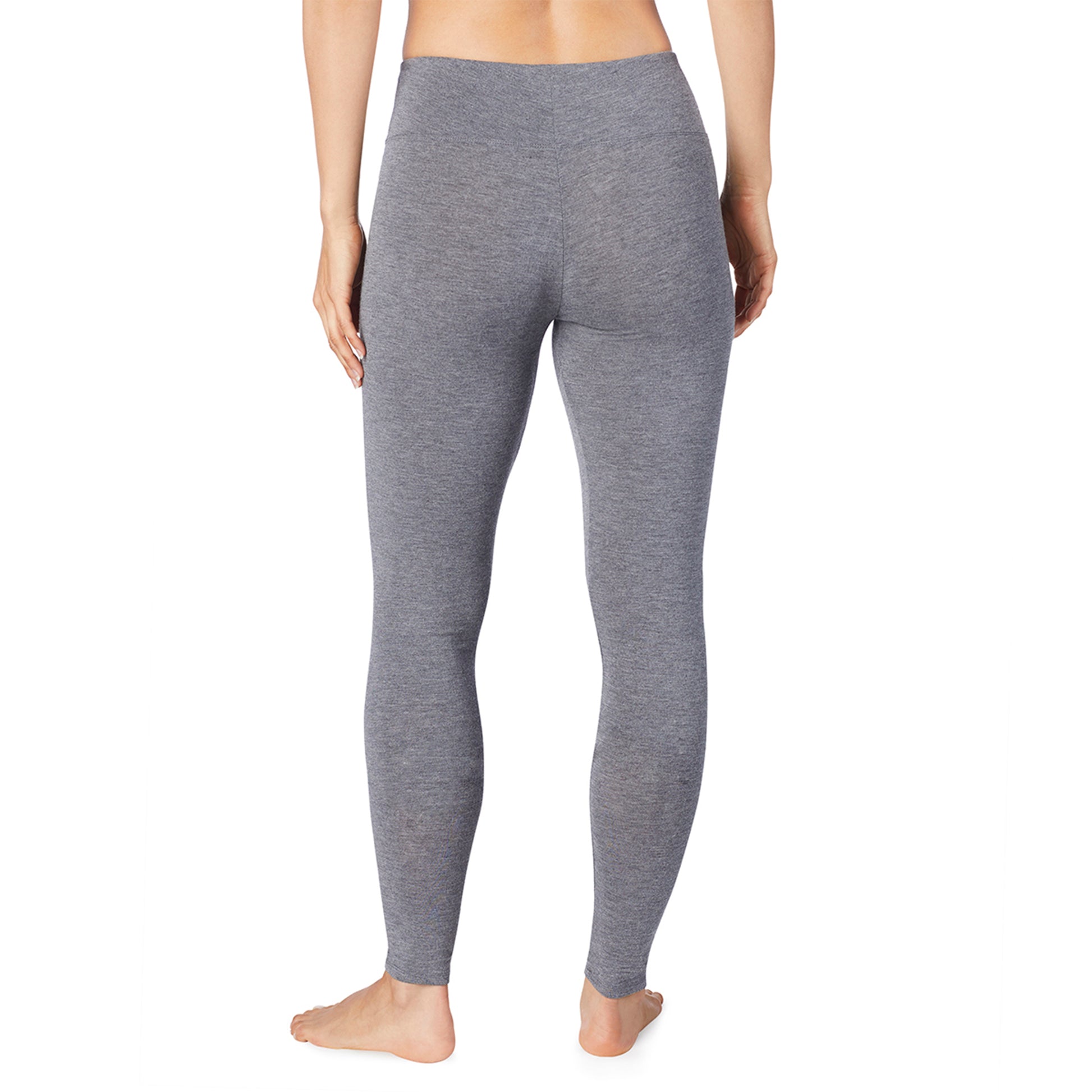 A lady wearing charcoal heather high waist legging petite.