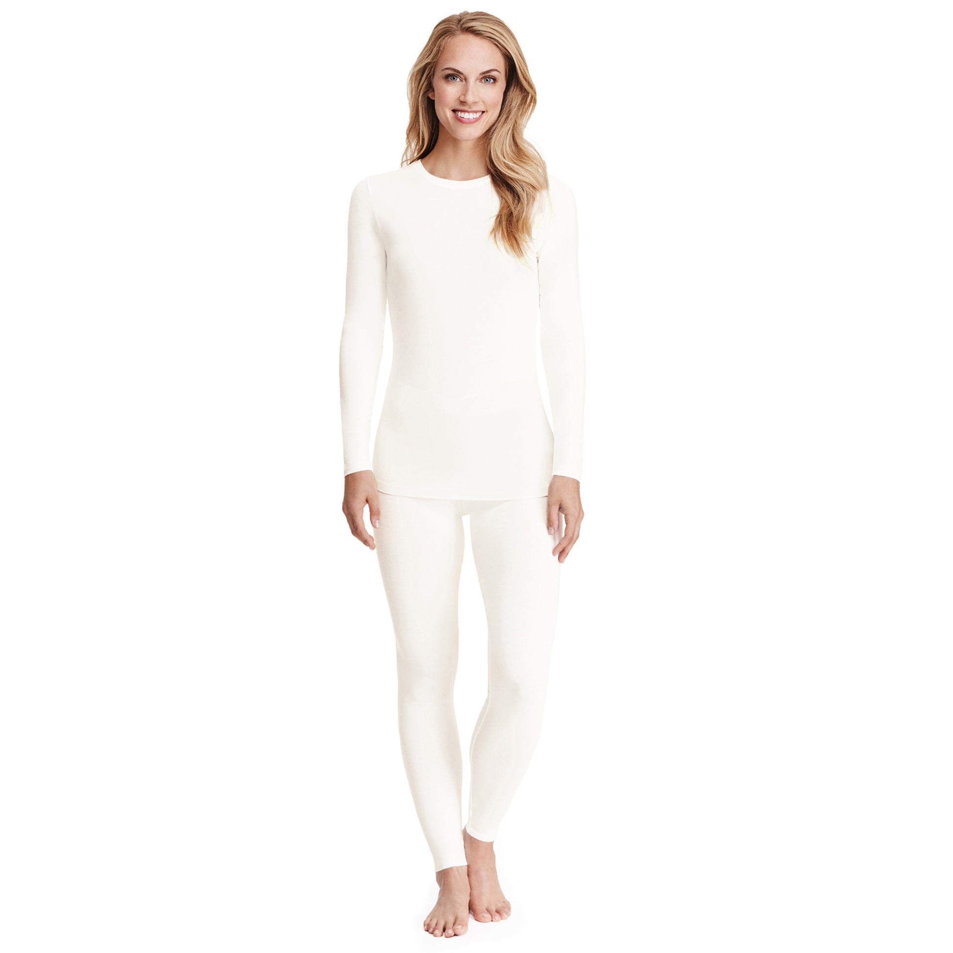 A lady wearing a ivory  long sleeve stretch crew PETITE.