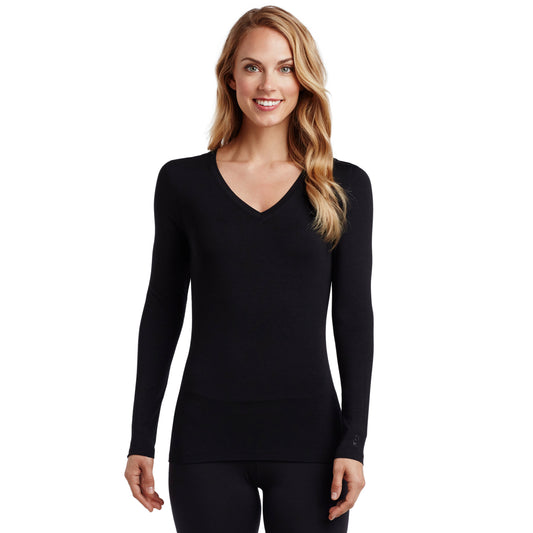 A lady wearing a black long sleeve stretch V-neck PETITE.