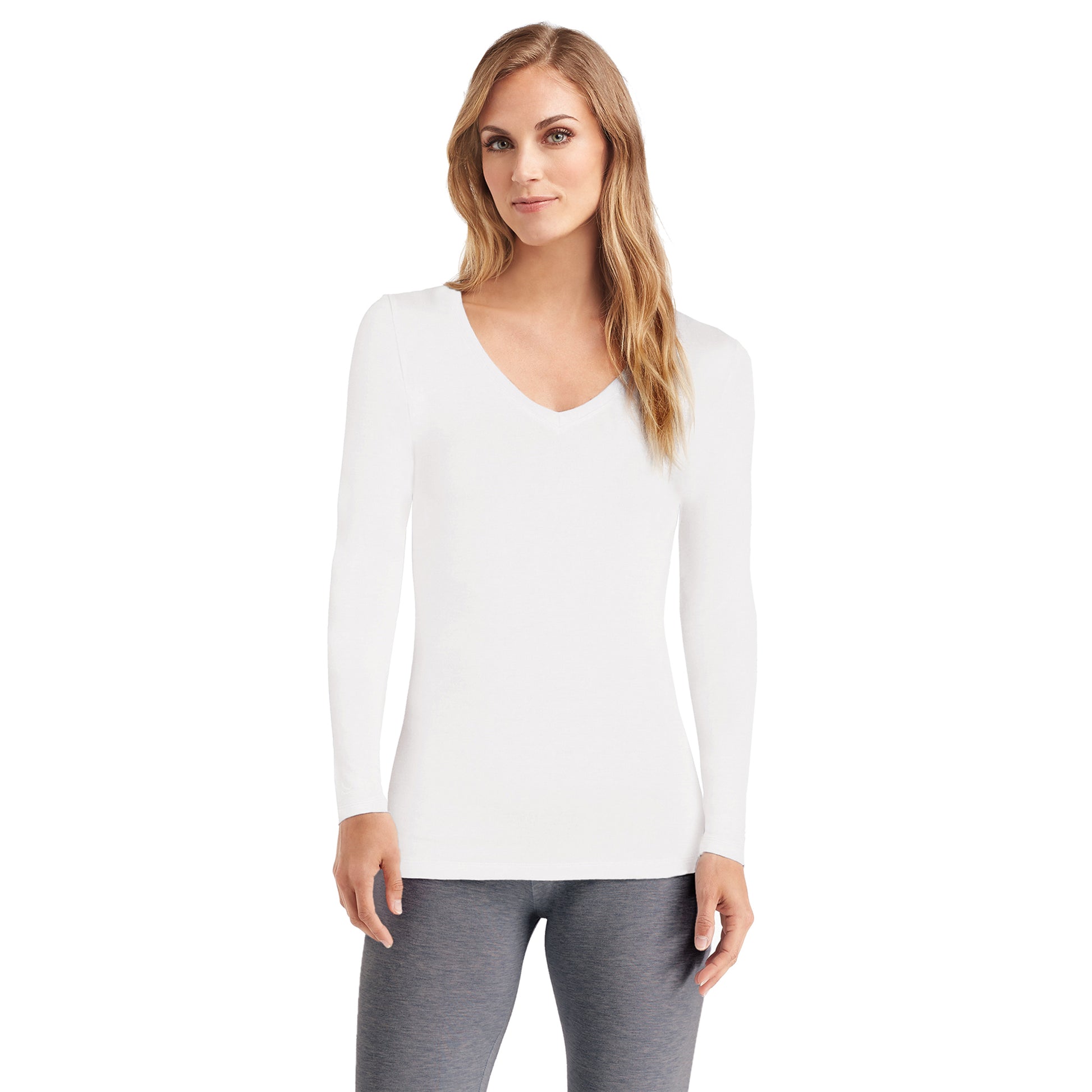 A lady wearing a ivory long sleeve stretch V-neck PETITE.