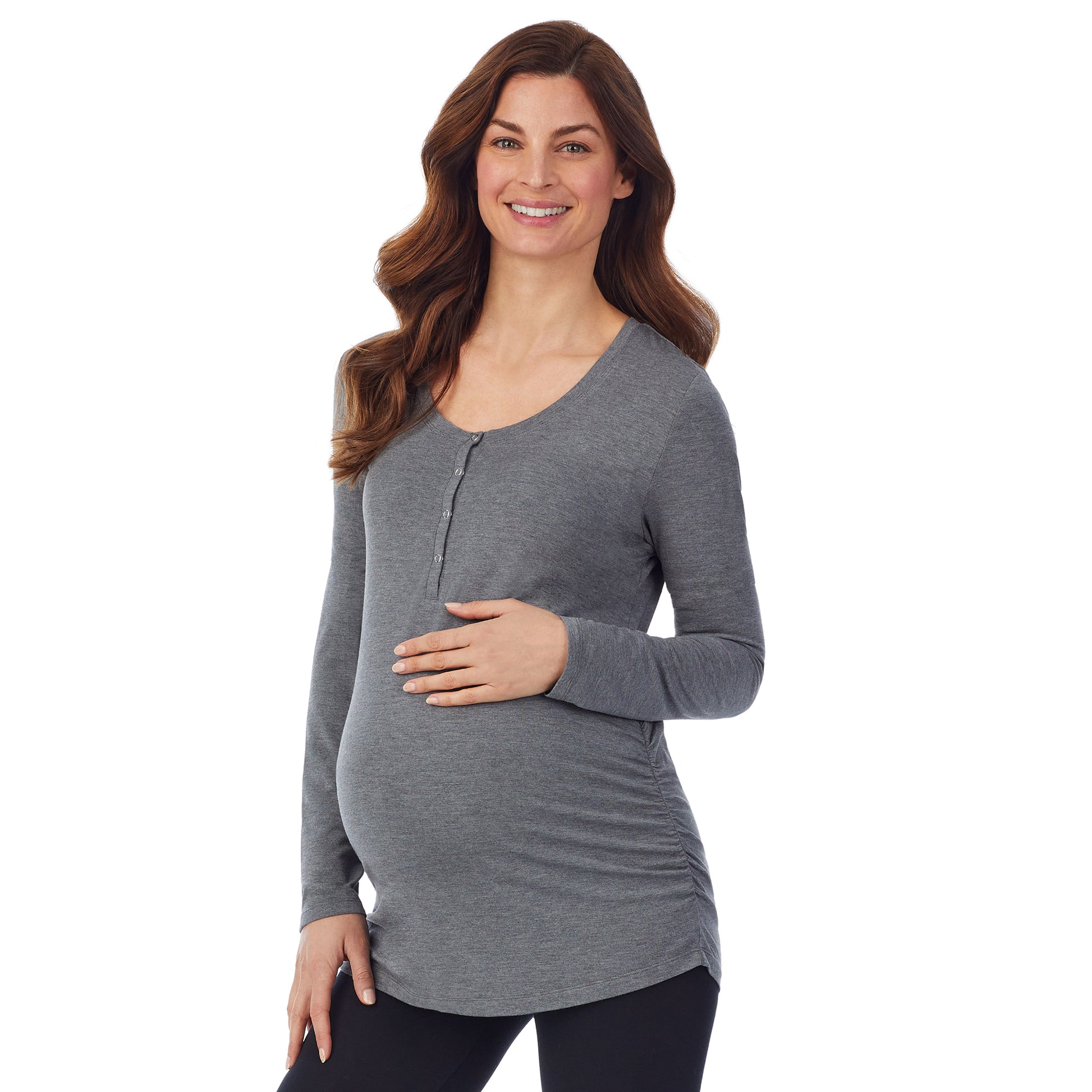 A lady wearing a charcoal heather long sleeve maternity snap front henley top. #Model is wearing a maternity bump.