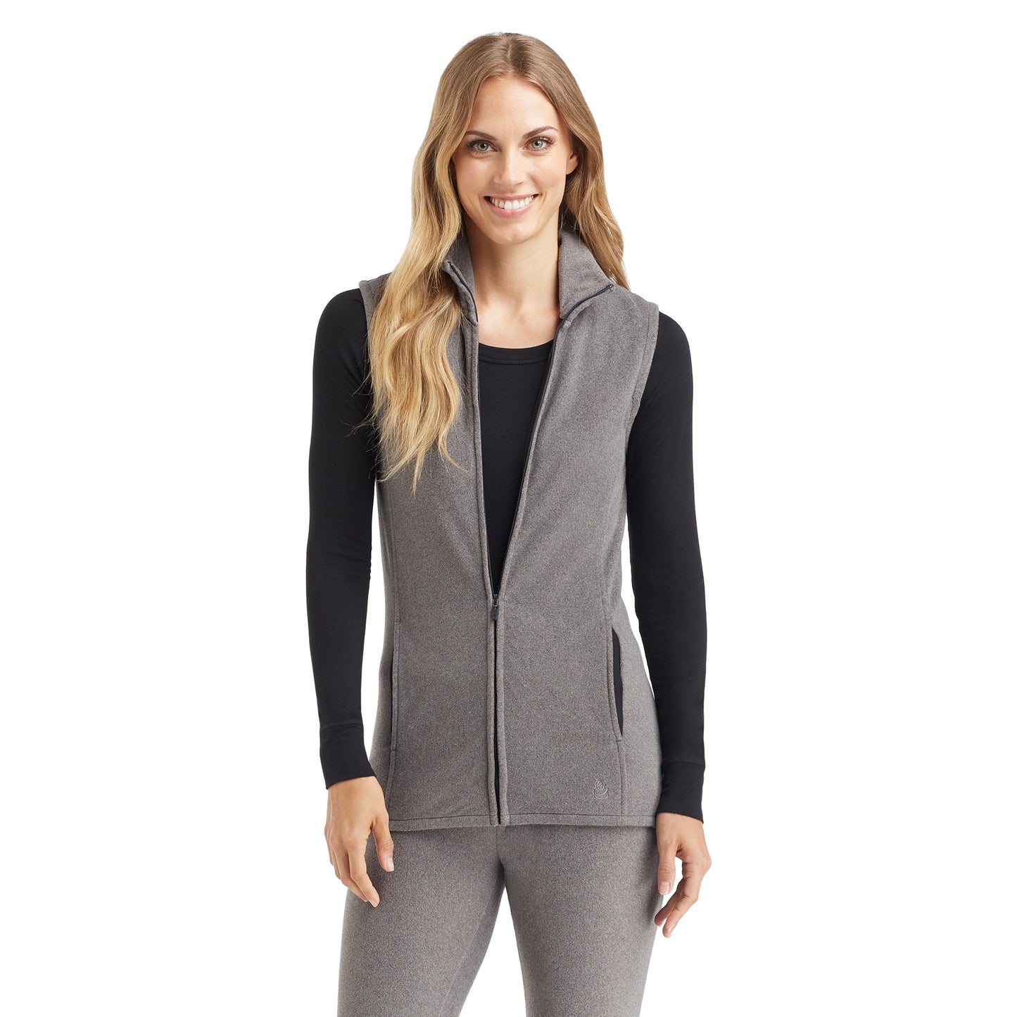 Charcoal Heather; Model is wearing size S. She is 5’9”, Bust 32”, Waist 25.5”, Hips 36”.@upper body of A lady wearing grey full zip vest !59% Polyester, 35% Recycled Polyester, 6% Spandex!