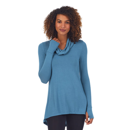 A lady wearing softwear with stretch long sleeve cowl tunic.