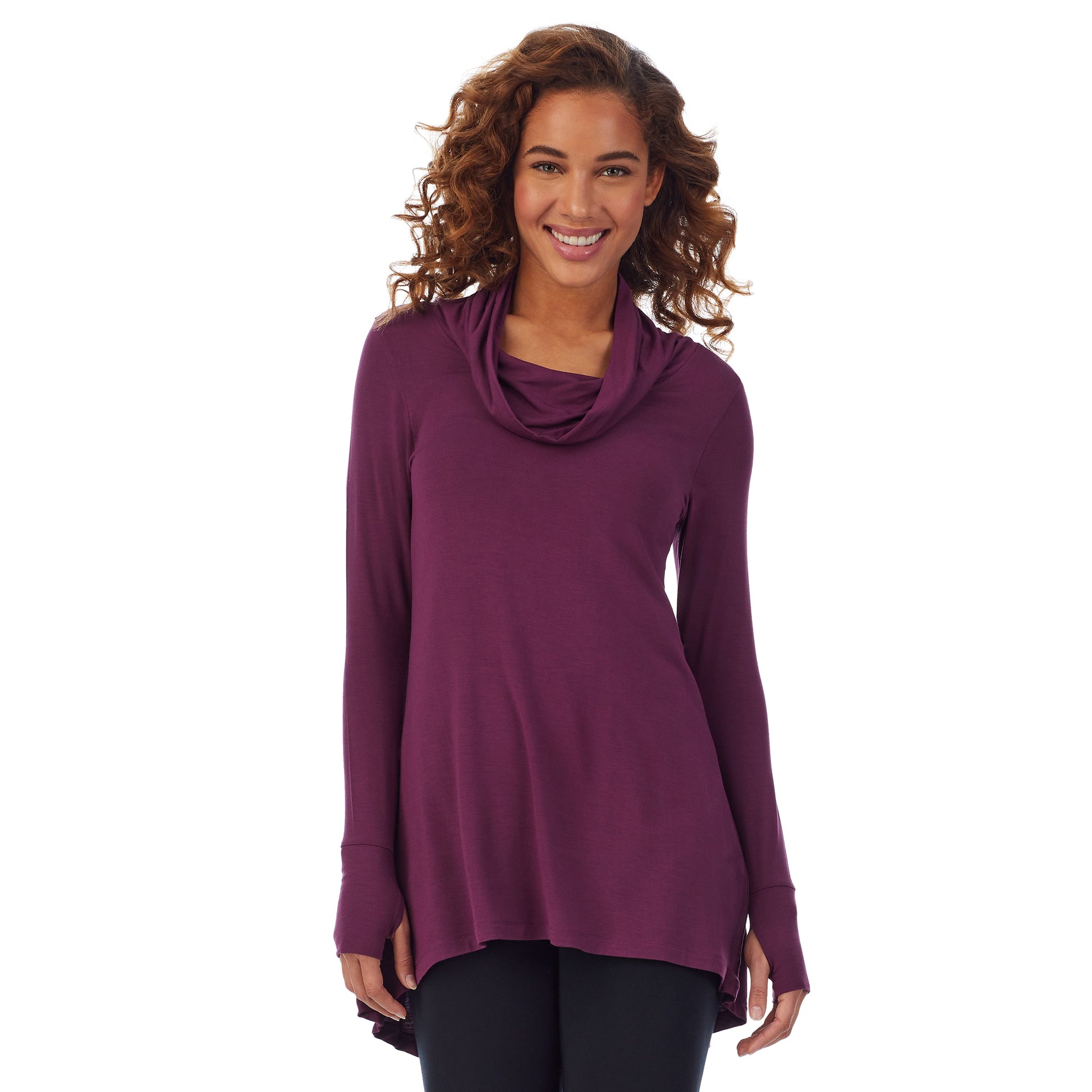 A lady wearing a grape long sleeve stretch cowl tunic.