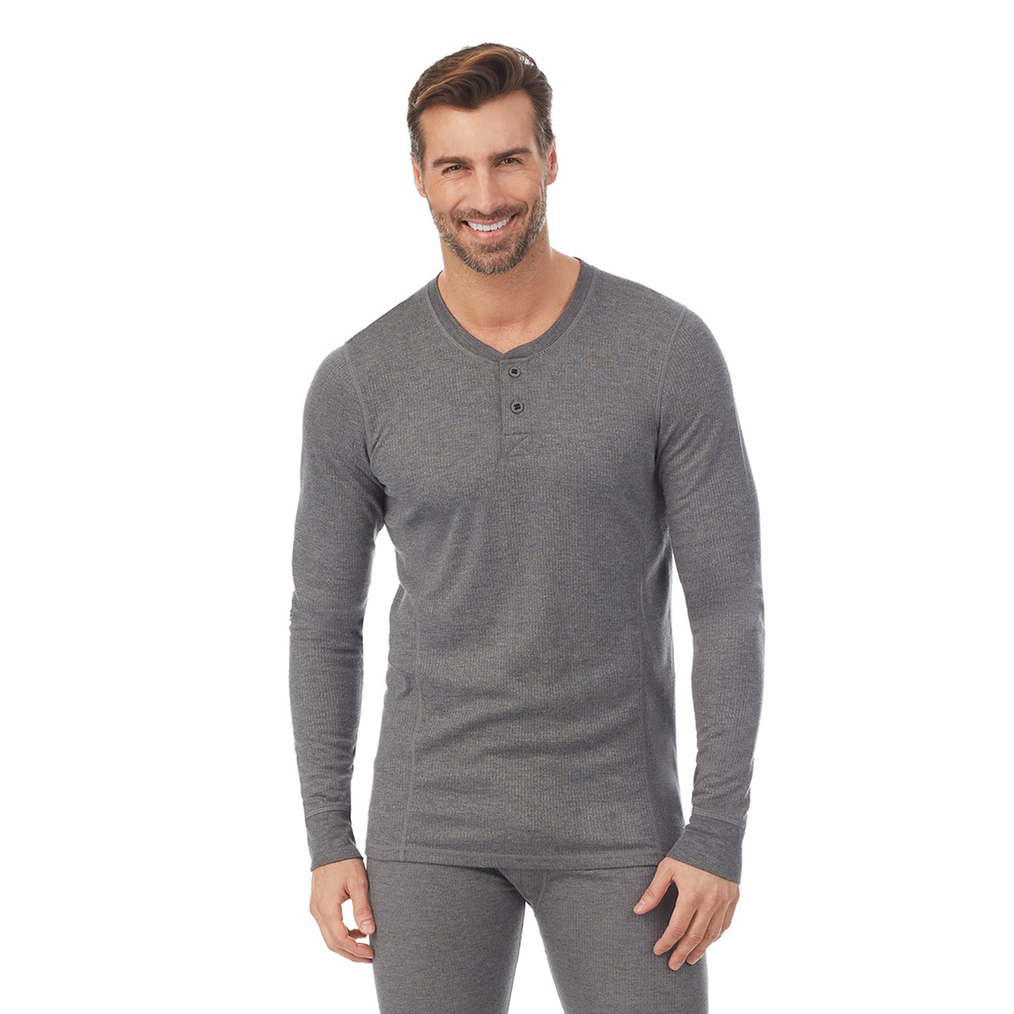 Charcoal Heather; Model is wearing size M. He is 6'1", Waist 32", Inseam 32".@A man wearing grey long sleeve henley