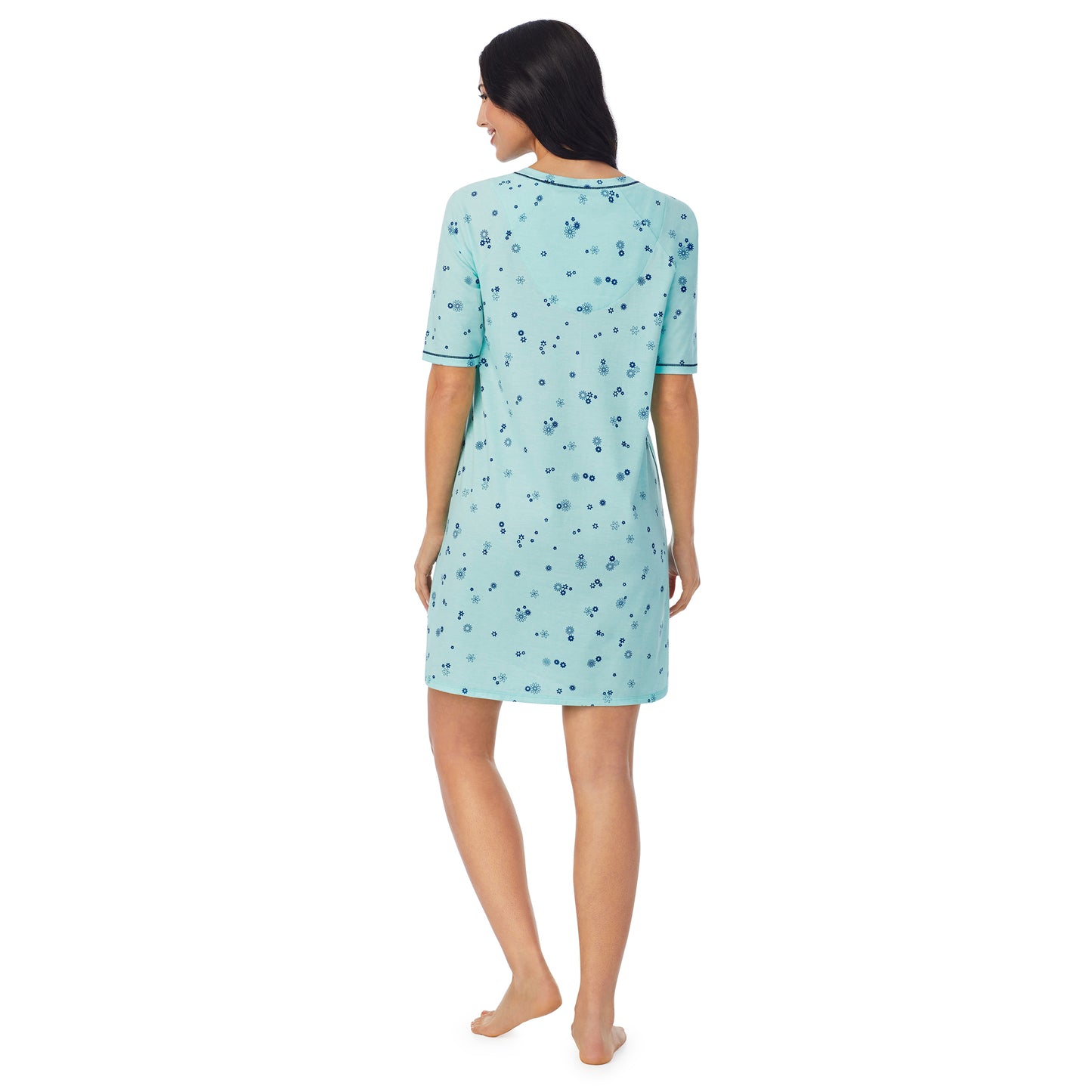 Mint Ditsy Floral;Model is wearing size S. She is 5'8.5", Bust 32", Waist 25", Hips 36".@ A lady wearingCuddl Smart Elbow Sleeve Sleep Tee with Mint Ditsy Floral print