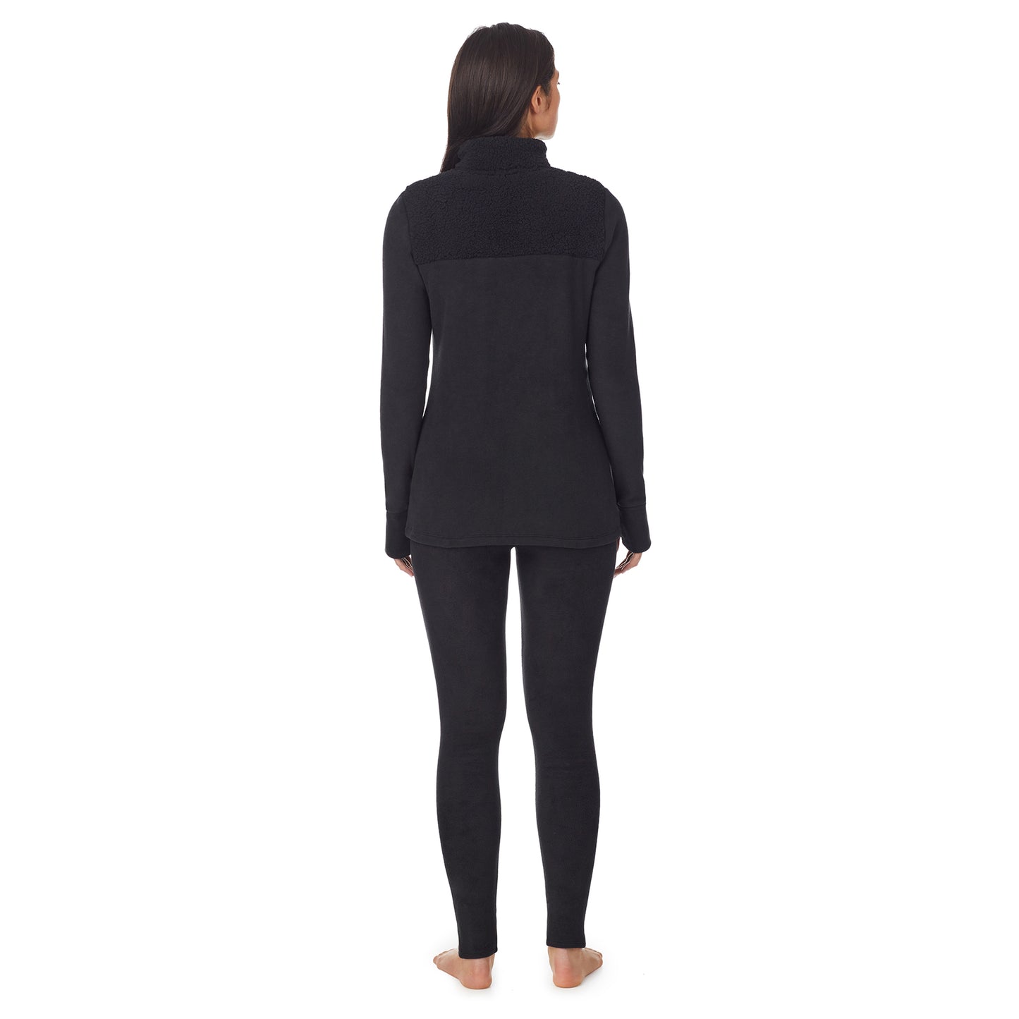 Black; Model is wearing size S. She is 5'8.5", Bust 32", Waist 25", Hips 36".@a lady wearing black long sleeve mixed media mock !59% Polyester, 35% Recycled Polyester, 6% Spandex!