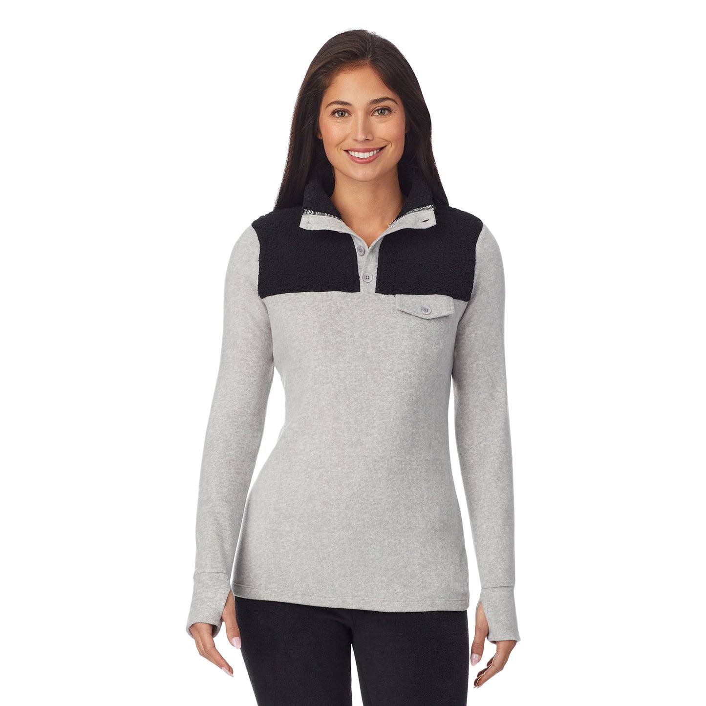 Light Grey Heather; Model is wearing size S. She is 5'8.5", Bust 32", Waist 25", Hips 36".@upper body of a lady wearing grey long sleeve mixed media mock !59% Polyester, 35% Recycled Polyester, 6% Spandex!